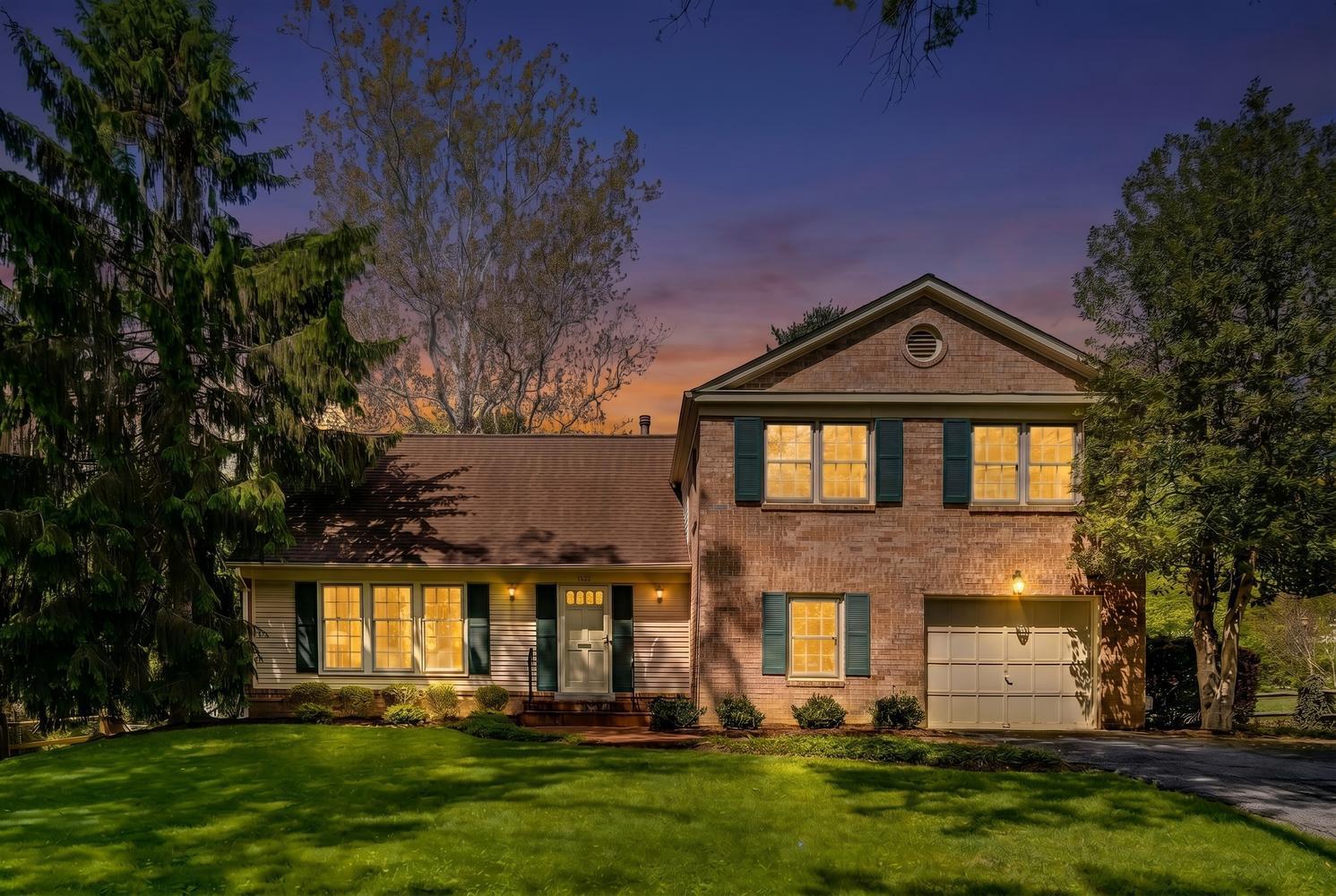 ***OPEN HOUSE SAT 6/6 1-4PM *** Welcome to this beautifully maintained split-level colonial home in the sought-after Whetstone community, where thoughtful updates, fresh paint throughout, and a warm, inviting layout to create the perfect place to call home.

Step inside to a classic center hall foyer featuring NEW LVT flooring and a convenient coat closet. The heart of the home is a well-appointed kitchen, showcasing raised panel honey maple cabinetry, granite countertops, stainless steel appliances, and a comfortable table space for everyday dining. Entertain with ease in the spacious dining room, highlighted by a new chandelier, and enjoy the seamless flow into the living room both enhanced by stylish luxury NEW LVP.

Just a few steps down, the expansive family room offers a cozy retreat with brand-new carpeting and a striking raised-hearth brick wood-burning fireplace. Sliding access leads to a large brick patio perfect for outdoor gatherings. This level also features a versatile home office or library, an additional coat closet, a half bath with ceramic tile, and interior access to the one-car garage.

Upstairs, the primary suite is a true haven with NEW carpeting, dual closets, and a dedicated dressing area with vanity. The en-suite bath includes a pedestal sink and step-in shower. Two additional bedrooms on this level also feature NEW carpeting and share a hall bath complete with a tub, ceramic tile, wood vanity, and recessed lighting.

The top level offers a spacious fourth bedroom with a large walk-in closet and additional storage ideal for guests, a home office, or flex space.

The lower level expands your living space with a generously sized recreation room featuring plush NEW carpeting, a closet, and extra storage under the stairs. A large laundry/utility room with new flooring includes a Bryant gas furnace and an A.O. Smith hot water heater, along with a dedicated workshop area for hobbies or projects.

Freshly painted throughout and thoughtfully updated, this home combines comfort, functionality, and charm complete with a one-car garage and inviting outdoor living space. A wonderful opportunity-don’t miss it! Lake Whetstone for kayaking and canoeing, walking trails, a sand volleyball court, and playgrounds, and multiple pools. All just minutes from everyday essentials like Aldi, Lidl, Starbucks, Hangry Joe’s, and more blending outdoor fun with unbeatable convenience. Major commuter routes-I-270, Route 200 (ICC), I-370 are just minutes away. Don’t miss the opportunity to own this distinctive home in the coveted Whetstone community — where privacy, space, and elegance come together.