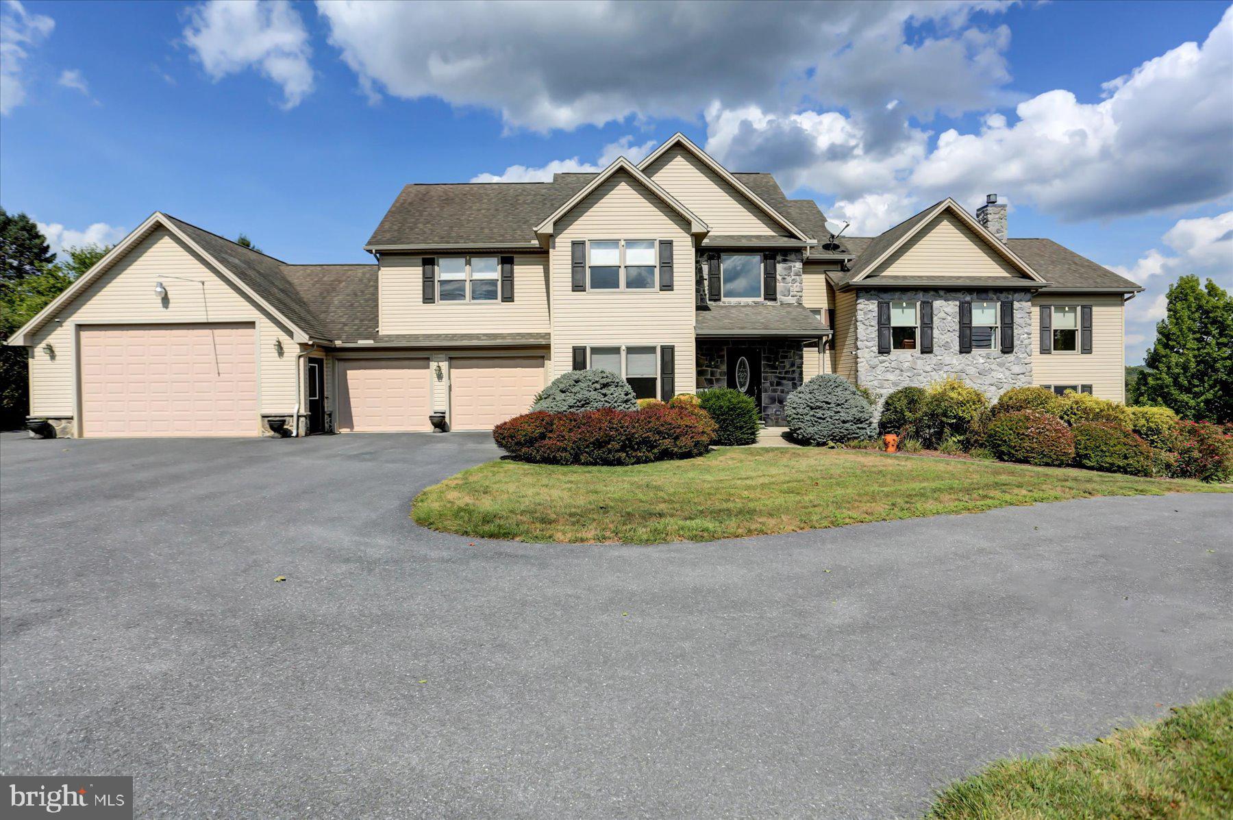 Welcome to 125 Old York Road! This custom, five bedroom Musser Built home is situated on nearly an acre and has an incredible amount of space (and fun) to offer!  The main home features 4 generously sized bedrooms, 2 full bathrooms and 2 half bath rooms, as well as a finished basement with bar and game room. The attached in-law/au pair suite includes a separate living room with propane fire place, full kitchen with range, refrigerator and dishwasher, separate bedroom and bathroom with walk in shower, laundry hook ups and private exterior access.   Your new favorite vacation spot will be a STAY-cation in your very own backyard oasis. Take the slide or take a dive into the 10 ft deep, heated, salt water concrete pool.  Or soak up the sun beside the pool and enjoy the beautiful hardscaping that surrounds you.  As a convenience for yourself and your guests, the pool area also features an outdoor half bathroom.   Additional features of the home include an oversized attached 3 car garage as well as a drive-around basement garage for all of your storage needs.   This home is conveniently located just minutes from Dillsburg Community Park, Dillsburg Elementary in Northern School District, and allows for an easy commute to Route 15!  Schedule your showing today!