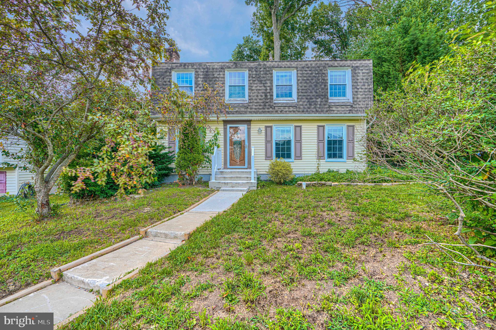 Welcome to this colonial-style residence, that offers a harmonious blend of modern amenities and classic charm, in the desirable Hallfield Manor subdivision. Built in 1976, this detached home spans 2,288 square feet, featuring four spacious bedrooms and two and a half bathrooms, ideal for both relaxation and entertaining. The interior showcases crown moldings and recessed lighting, enhancing the ambiance throughout. The gourmet kitchen, equipped with stainless steel appliances, granite countertops and wood cabinetry, includes a breakfast area and an eat-in space, perfect for casual dining. The primary bath with tile walls and floors offers a comfort and serene retreat, while the fully finished basement provides additional living space, allowing for versatile use. Exterior features a generous front and rear yard, with a deck that invites outdoor gatherings and backs to lush trees, ensuring privacy and a tranquil setting. A convenient shed offers additional storage solutions. This home is situated in a vibrant community with easy access to local dining, supermarkets and shopping. The combination of its thoughtful design and prime location makes this property an exceptional opportunity for discerning buyers seeking a comfortable and stylish living environment.