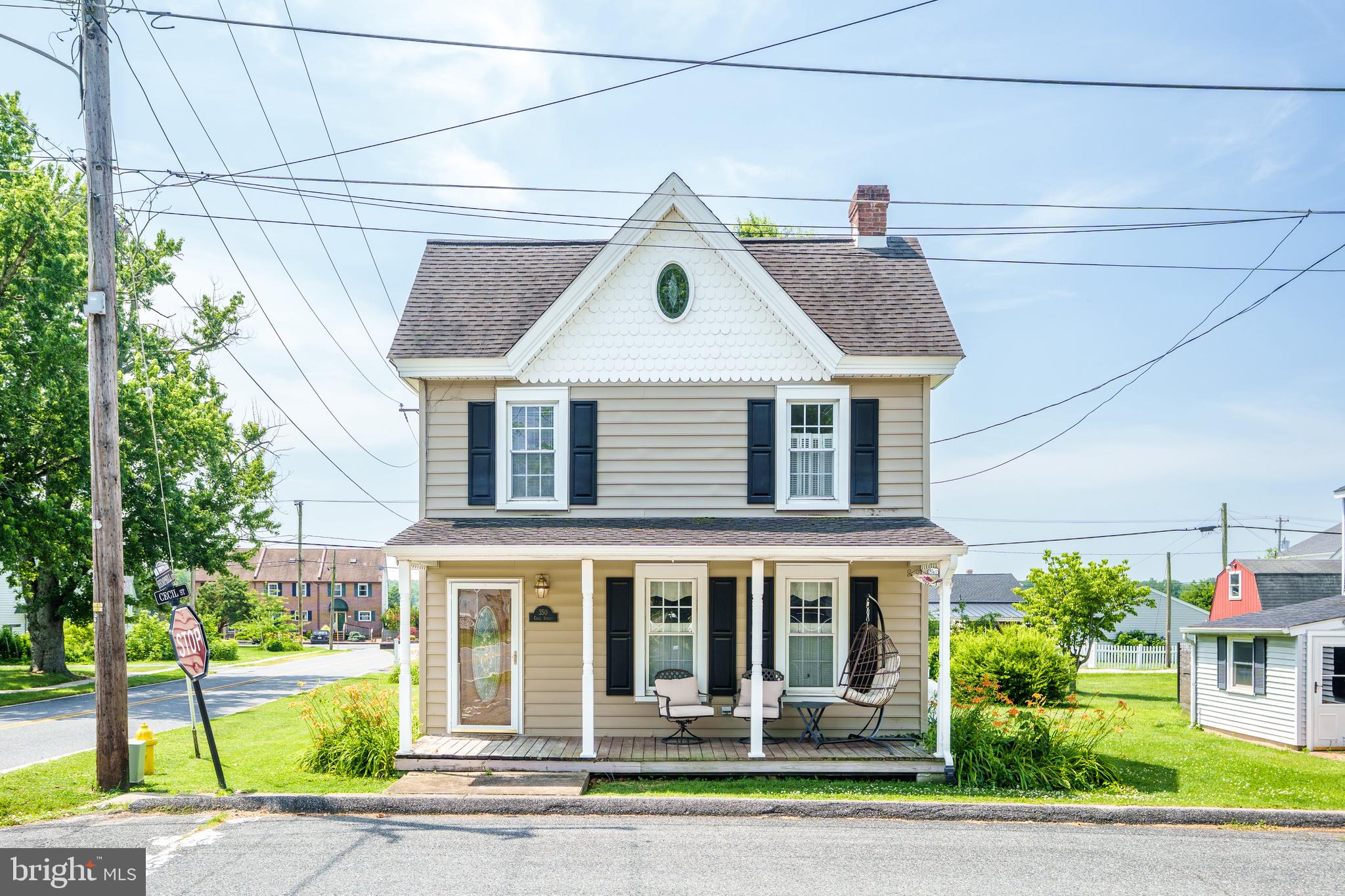 Coming soon! Showings to start June 12. There’s no place like home in charming North Chesapeake City! Just moments from the C&D Canal Trail and Schaefer’s Canal House, this 3 bedroom, 2 full bath home blends timeless character with everyday comfort. From the inviting covered front porch to the warm interior finishes, this home is full of charm. Features include hardwood floors, crown molding, cathedral and beamed ceilings, a fireplace, propane stove, clawfoot soaking tub, and spacious second-floor rooms filled with natural light. The updated gourmet kitchen offers granite countertops, center island seating, and plenty of space for entertaining. Seller updates include mini-split systems and a new garage roof installed in 2023. Additional highlights include a walk-up attic for storage, oversized one-car garage with walk-up storage above, private off-street parking, and a location convenient to local shops, dining, and waterfront attractions. Schedule your private tour today and see all this Chesapeake City gem has to offer!