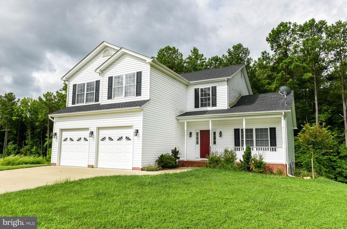 4000 sq ft in this 5 yr old colonial. Beautiful hardwood floors on main level, crown molding & chair railing. Dura Ceramic tile in kitchen & baths, maple cabinets & granite counter tops. Access deck from Breakfast area. Master Suite w walk in closet. Fully finished lower level, w Rec. Rm, BR and Bath. Walkout to backyard, backs up to trees. On cul de sac Convenient to PAX River NAS. Also for sale.