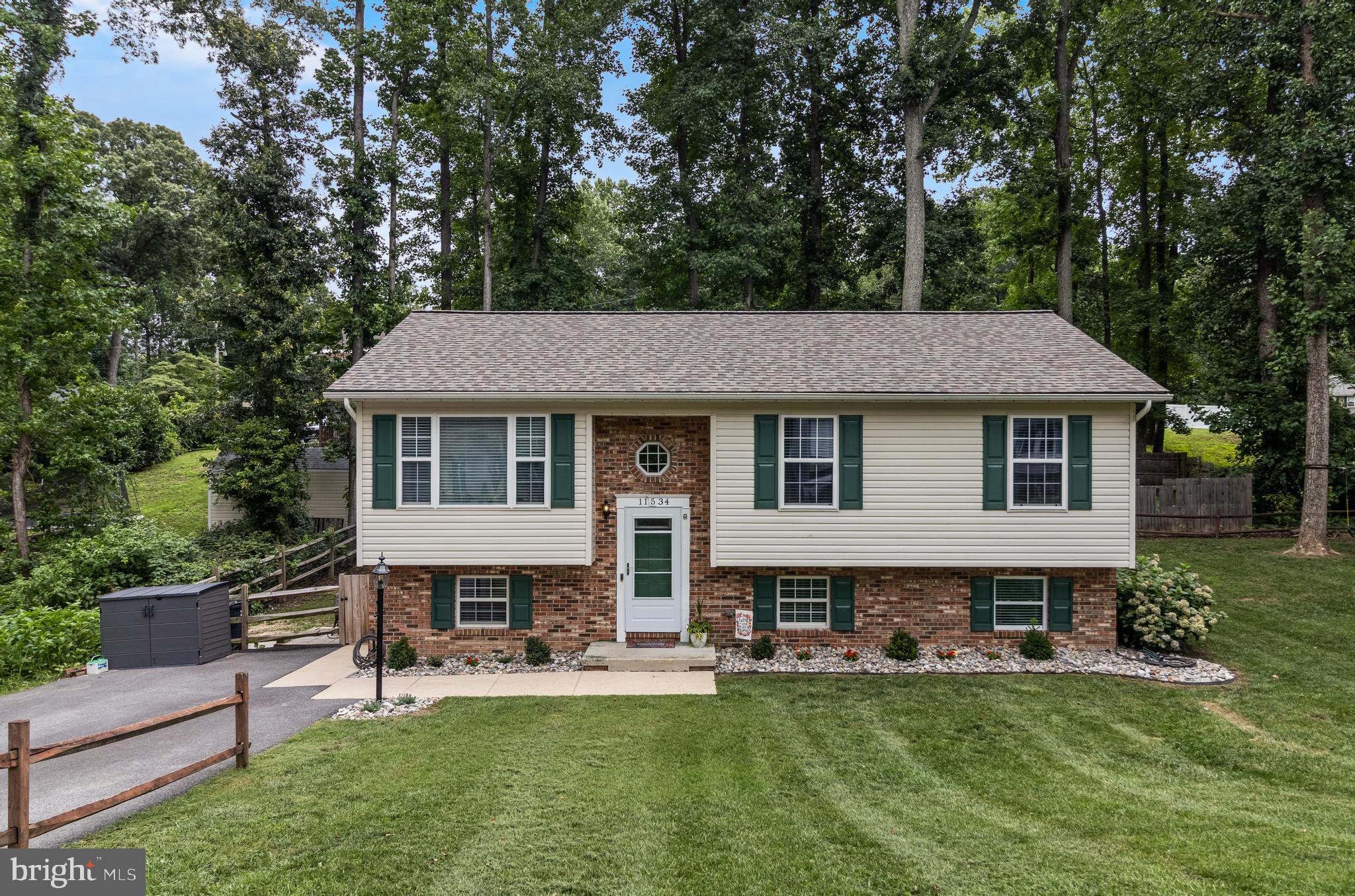 Well maintained home on a great lot in Chesapeake Ranch Estates. This owner has updated and added so many features to this home, make sure you do not miss it! NO CARPET, laminate and LVP throughout  the home, new paint, hot water heater, gutters and gutter guards, new fans and ceiling light fixtures, 12x23 maintenance free deck off of the back of the home, dishwasher, stove and microwave are all new, Newer roof and renovated basement with a bedroom, full bath, and recreation room, plus the laundry is down here.  Septic was recently pumped and seller added a Radon system for peace of mind.  LARGE yard and home sits off of the road with plenty of space completely around the home. Primary suite has a walk in closet and a full bath, great kitchen with eat in area with the deck off of it. Makes perfect grilling evenings, plus you can relax on your deck with a wooded backyard. This home shows the pride of homeowners!   Make your appointment to see this great house!