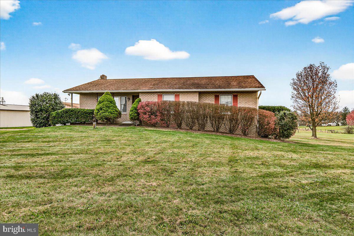 Unlock the Potential in Taneytown! This classic brick home, setting on a fully scenic 1.87 acre, offers solid bones and endless possibilities. Whether you’re a handy homeowner or an investor, this property is a perfect opportunity to renovate, personalize, and build equity. The main level features just over 1,500  finished square feet including 3 bedrooms, 2 full baths, a spacious living room, separate dining area, kitchen, and an enclosed sunroom/florida room.  The unfinished basement provides an additional square feet ready to be finished for expanded living space.  The property has an oversized garage which could be a perfect area for a mechanic, outside storage, or storing your favorite items.  While the home primarily needs updating, it should qualify for FHA, VA, USDA, or Conventional financing.   Estate Sale – Sold As-Is. No exceptions! All inspections are for informational purposes only. There is personal property, trash, and debris, and will be the responsibility of the Buyer to remove.