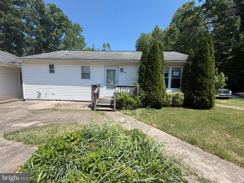 Welcome home to this tucked away residence in Essex. This is a great opportunity for primary residents who don't mind some repairs or for an investor who is seeking an investment opportunity. The exterior offers a large flat yard with over 1/2 an acre and lots of parking space. The property is located on a peaceful and quiet dead end road yet close to all amenities such as  restaurants, beaches, shopping, community boat ramp and major roads. The 1st house features a living room, dining area, 2 bedrooms and a full bath. The 2nd home, which has its own entrance, is equally as big and also offers 2 bedrooms and a full. This home offers great privacy for those seeking a peaceful setting.
