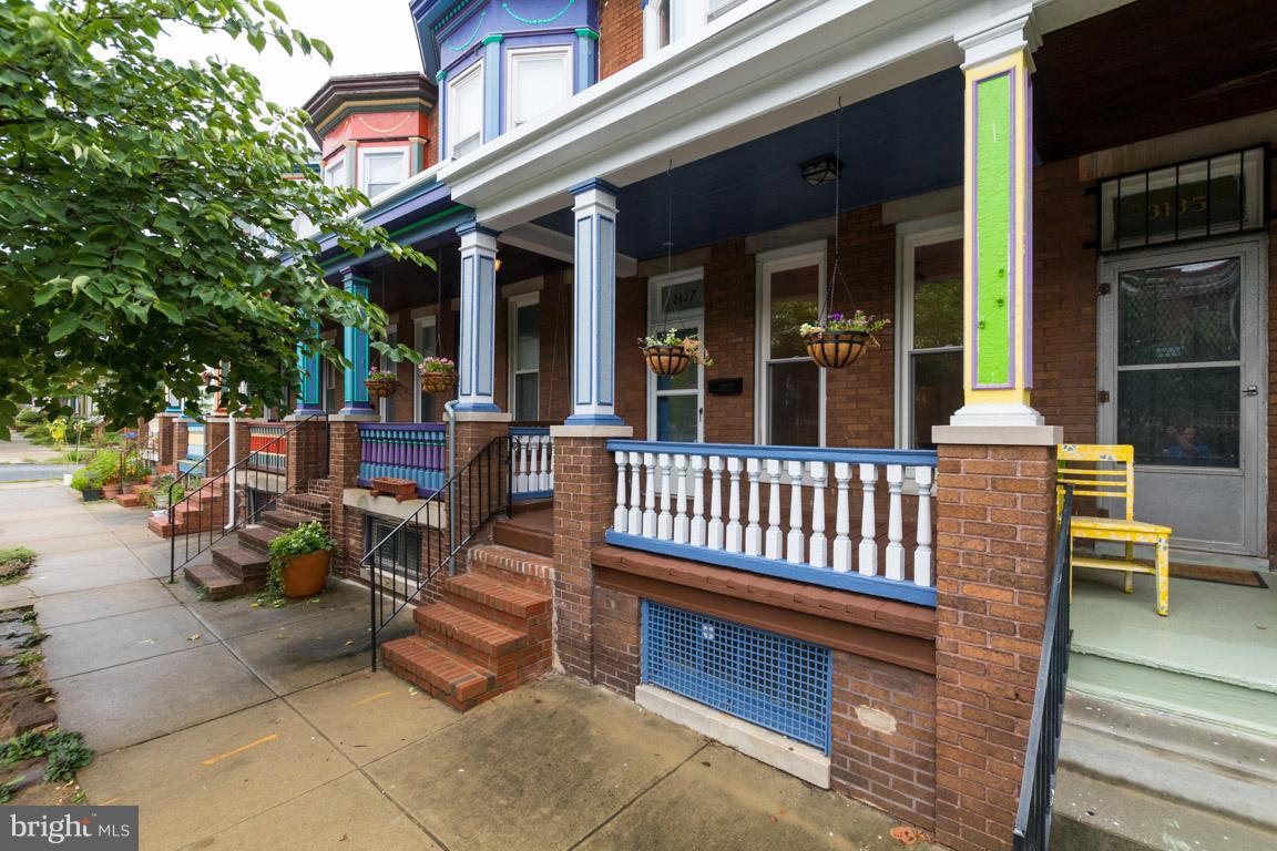 Live on one of Baltimore's most colorful streets! The Painted Ladies of Abell's tree lined street are surrounded by the amenities of Charles Village and Waverly.  3 bedrooms, 1.5 baths, original hardwood throughout. Well designed kitchen with custom cabinetry, deck and yard out back, and a large open basement that could be finished for more space. Well maintained and updated. Take a look!