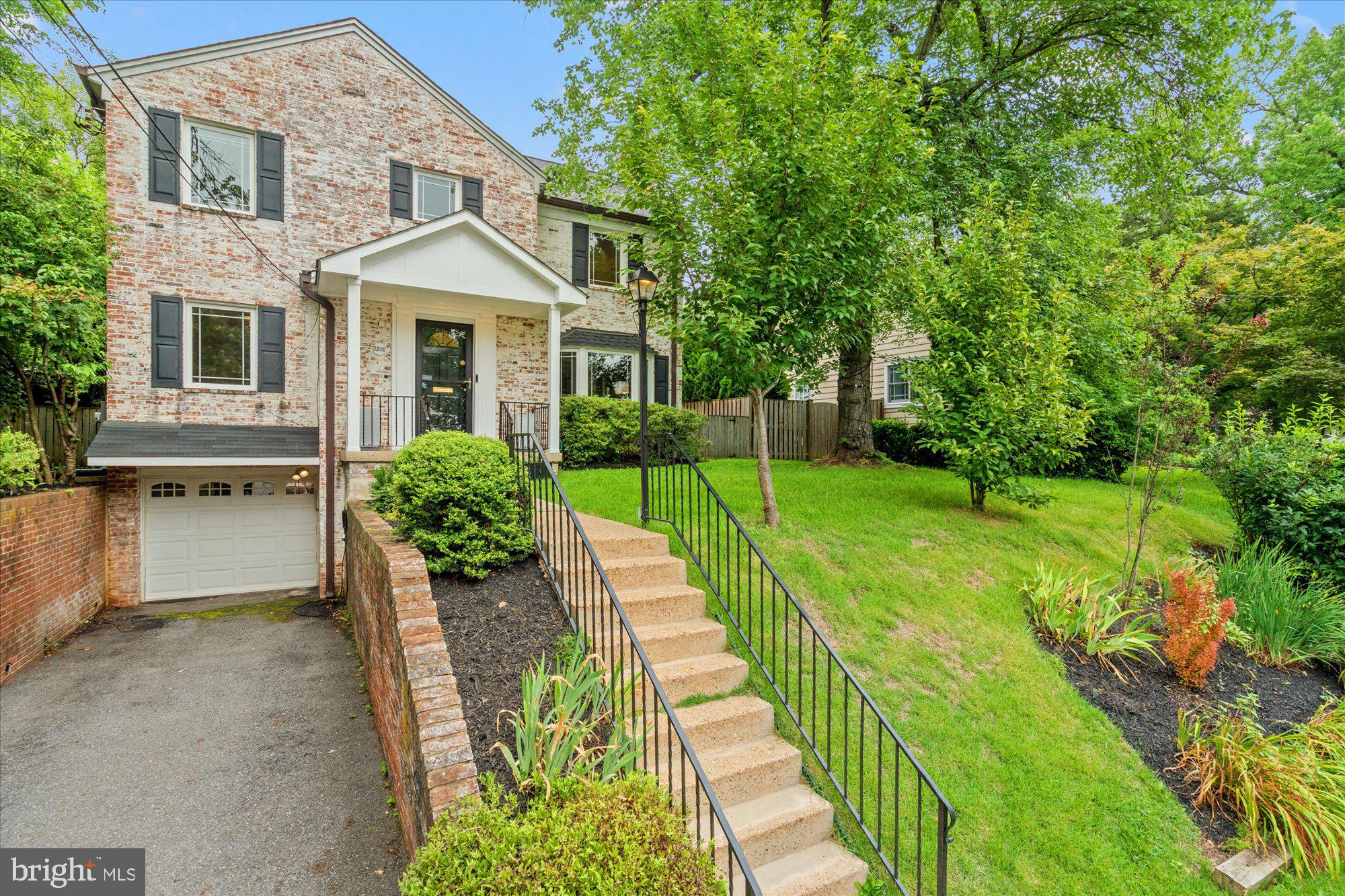 Nestled in one of Chevy Chase, Maryland's most desirable neighborhoods, this beautifully expanded brick Colonial offers the perfect blend of timeless architecture, modern updates, and an exceptional location. Featuring 5 bedrooms, 3.5 bathrooms, a one car garage, a functional mudroom, and a light filled floor plan, this move in ready home showcases gleaming hardwood floors, updated kitchen and baths and spacious living areas designed for today's lifestyle.  The updated kitchen flows seamlessly into the expansive family room with direct access to the private fenced backyard, creating the ideal setting for everyday living and entertaining. Enjoy outdoor dining on the flagstone patio, relax in the hot tub, and appreciate the beautifully landscaped yard. A dedicated main level office provides the flexibility today's buyers desire for working from home, studying, or creative pursuits. Outdoor enthusiasts will love being just steps from Rock Creek Park, scenic walking and biking trails, and a neighborhood farm stand. Ideally located near the future Purple Line, the home also offers convenient access to downtown Bethesda, Washington, DC, shopping, parks, entertainment, and top rated schools.  Thoughtfully maintained with major capital improvements, including a new HVAC system (2023), sewer line replacement to the street (2023), chimney liner (2020), and roof (2016), this exceptional Chevy Chase home combines timeless charm, modern updates, and an unbeatable location in one of Montgomery County's most sought after communities.
