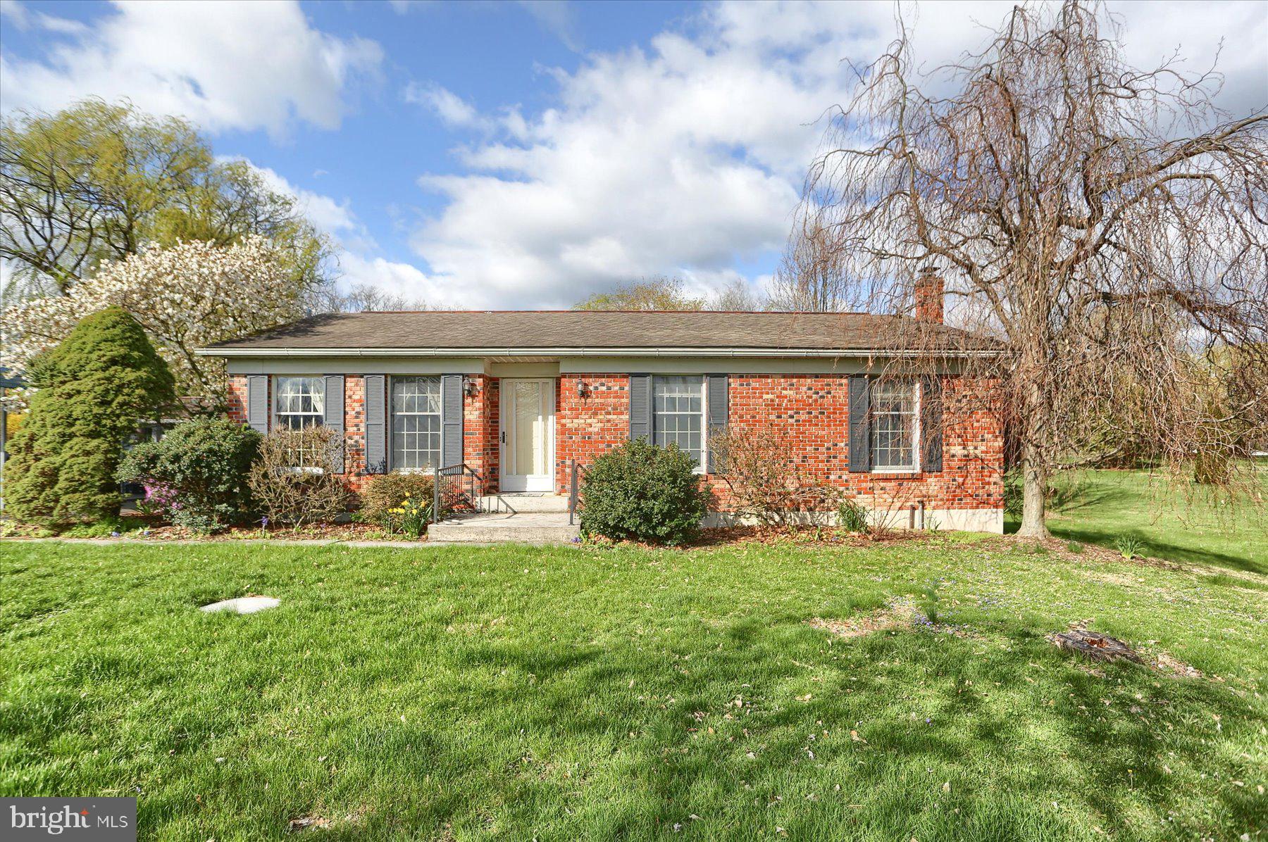 Nice ranch home close to everything!  Walk into a large living room offering lots of space.  There are newer Pergo floors in the kitchen and dining room.  The main bedroom has an attached 1/2 bath for convenience, 
 2 more bedrooms and a full bath complete the main level.  Downstairs is a large dry basement with lots of opportunities to grow. Outside is a large 1-acre lot for all of your outdoor activities.  Sit on the covered back porch and enjoy the scenery.  A detached 2 car carport completes the exterior amenities.