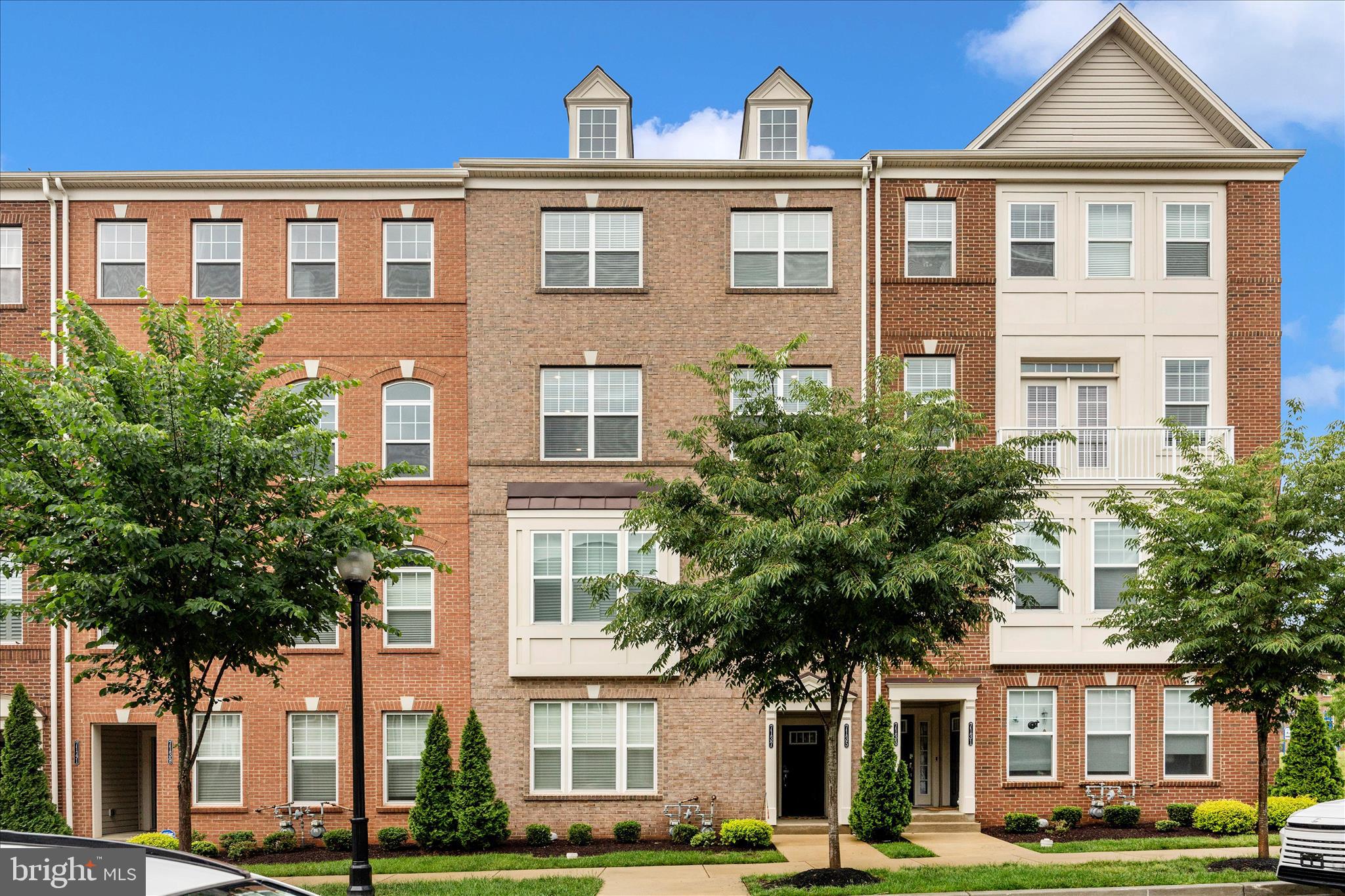 Introducing this impeccably maintained 3-bedroom, 2.5-bath townhome-style condo in the highly sought-after Westview South community in Frederick. Ideally located just minutes from Downtown Frederick, Westview Promenade, premier shopping and dining, and major commuter routes, this exceptional home offers the perfect blend of luxury, comfort, and convenience.

Step inside to discover a beautifully designed open-concept layout featuring luxurious LVP flooring throughout the main living area, creating a seamless balance of elegance and durability. The gourmet kitchen is truly the heart of the home, showcasing quartz countertops, stainless steel appliances, a gas cooking range, and ample cabinetry—perfect for both everyday living and entertaining.

The spacious primary suite serves as a private retreat, highlighted by a tray ceiling, oversized walk-in closet, and a spa-inspired en-suite bath complete with tile flooring, dual vanities, and an oversized walk-in shower. Two additional generously sized bedrooms and a stylish full bath provide flexibility for family, guests, or a home office. A dedicated laundry area with washer and dryer adds everyday convenience.

This home enjoys added privacy and abundant natural light throughout. The thoughtfully designed layout combines modern sophistication with functional living spaces, making it ideal for today’s lifestyle.

Residents of Westview South enjoy access to outstanding resort-style amenities, including an 8,000-square-foot clubhouse featuring a fitness and yoga center, game room, demonstration kitchen, swimming pool, walking paths, library, and community tot lot conveniently located nearby. Ample visitor parking makes entertaining effortless.

This is a rare opportunity to own a beautifully upgraded home in one of Frederick’s most desirable communities. Don’t miss your chance to experience stylish, low-maintenance living at its finest.
