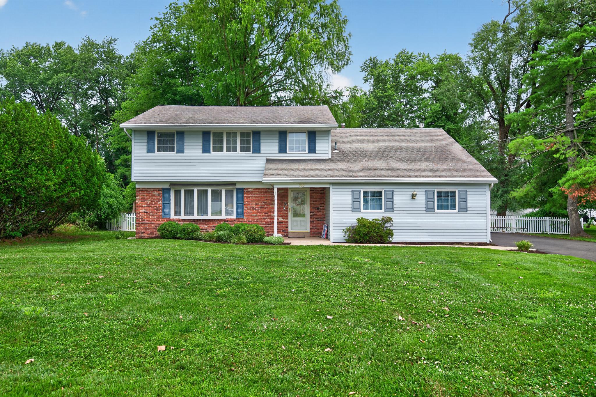 Home Sweet Home!  Spacious, 5 bedroom, 2.5 bath well kept colonial sitting on a wonderful .48 acre lot.  A front covered porch leads you to the entry foyer with solid hardwood flooring that expands throughout most of the home.  The large living rm features a bow window, crown molding and a classic built in. Formal dining rm w/chandelier and lovely bay window overlooking the rear fenced yard. The well appointed kitchen features cherry cabinetry, Corian counter tops, ceramic tiled backsplash, stainless steel appliances new in 2020, recessed lighting, large pantry closet, ceiling fan and a chandelier in the eating area.  There is a utility room w/access to the crawl space area. Step down to the cozy family room featuring wood accents, ceiling fan, there are decorative oval windows on both sides of the brick fireplace featuring a slate mantel and slate hearth. There are french doors to the rear screened porch with skylights, ceiling fan and electric. The 21x16 screened porch overlooks a beautiful rear fenced yard with mature trees and landscaping.  There is a rear shed for outside equipment. There is a convenient powder rm off the den.  The laundry rm is equipped with a washer, dryer and laundry sink.  There is a pantry/dry bar area perfect and a large storage closet with shelving for all your storage needs.  The garage is currently used as a work shop area w/electric, shelving and work benches.  The Upper level will surprise you with a large bonus rm or 5th bedroom with massive closet space.  This room features recessed lighting, a ceiling fan and 3 large closets.  There is a beautiful new hall bathroom, pull down stairs to a large attic is perfect for seasonal storage.  The primary bedroom has a walk in closet with custom built in for storage, ceiling fan and updated bathroom with a shower stall. Three additional spacious bedrooms.  The home has newer windows and all mechanicals have been well maintained.  Additional photos coming soon