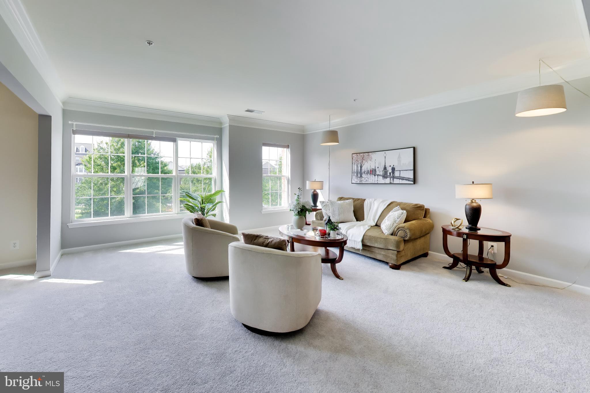 Welcome to 15330 Kensington Park Drive, an exceptional luxury townhome-style condominium located in the highly sought-after gated Potomac Club community in Woodbridge, Virginia. Offering over 2,300 square feet of beautifully designed living space, this spacious three-bedroom, two-and-a-half-bath residence combines modern comfort, convenience, and an unbeatable Northern Virginia location.

From the moment you enter, you'll appreciate the open-concept floor plan, abundant natural light, and thoughtfully designed spaces ideal for both everyday living and entertaining. The gourmet kitchen features ample cabinetry, generous counter space, and a seamless flow into the dining and living areas, creating the perfect setting for gatherings with family and friends.

The spacious primary suite offers a private retreat with a luxurious ensuite bath and large walk-in closet. Two additional bedrooms provide flexibility for guests, a home office, or growing households. An attached garage and additional storage add convenience and functionality.

Located within the prestigious Potomac Club gated community, residents enjoy access to resort-style amenities, including a clubhouse, fitness center, indoor and outdoor swimming pools, playgrounds, walking trails, and community gathering spaces.

Commuters will appreciate the home's prime location just minutes from Interstate 95, Express Lanes, Route 1, commuter lots, and VRE stations, providing convenient access to Washington, D.C., Fort Belvoir, Quantico Marine Corps Base, Arlington, Alexandria, and major Northern Virginia employment centers.

Shopping, dining, and entertainment are right around the corner at Potomac Mills, Stonebridge at Potomac Town Center, Wegmans, Alamo Drafthouse Cinema, and numerous restaurants and retail destinations. Outdoor enthusiasts will enjoy nearby parks, golf courses, marinas, and the scenic Potomac River waterfront.

If you're searching for a home in Woodbridge, VA that offers a gated community lifestyle, resort-style amenities, exceptional commuter access, and proximity to premier shopping and dining, 15330 Kensington Park Drive presents an outstanding opportunity to experience the best of Prince William County living.

Schedule your private tour today and discover why Potomac Club remains one of Woodbridge's most desirable communities.