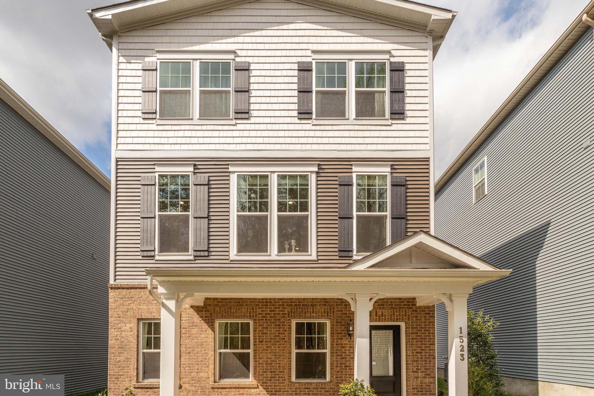 ASSUMABLE VA LOAN AT a 2.25% INTEREST RATE IS AVAILABLE TO QUALIFIED VA BUYERS!  Solar panels are owned!  Welcome to this beautiful 3-bedroom home offering a bright and airy open-concept floor plan with stylish finishes and flexible living spaces throughout. Elegant staircases with detailed iron spindles add character and sophistication to the home's design. The stunning kitchen features a large center island with breakfast bar seating, a classic subway tile backsplash, and stainless steel appliances including a gas range—perfect for both everyday living and entertaining.


The adjacent dining area is filled with natural light and offers peaceful wooded views through expansive windows, while the family room features a sliding door leading to the deck for easy indoor-outdoor living. The main level also includes two additional rooms ideal for bedrooms, home offices, or flex space, along with a convenient half bath.


The lower level expands the living space with a large room perfect for a second family room, recreation area, or media room, along with a full bathroom and garage access. Upstairs, you'll find three spacious bedrooms and a full hall bath with a double sink vanity. The impressive owner's suite offers two closets and a private ensuite bathroom with a double sink vanity.


Additional highlights include a 2-car garage and a prime location close to shopping, dining, and Arundel Mills. This home perfectly combines comfort, style, and convenience.