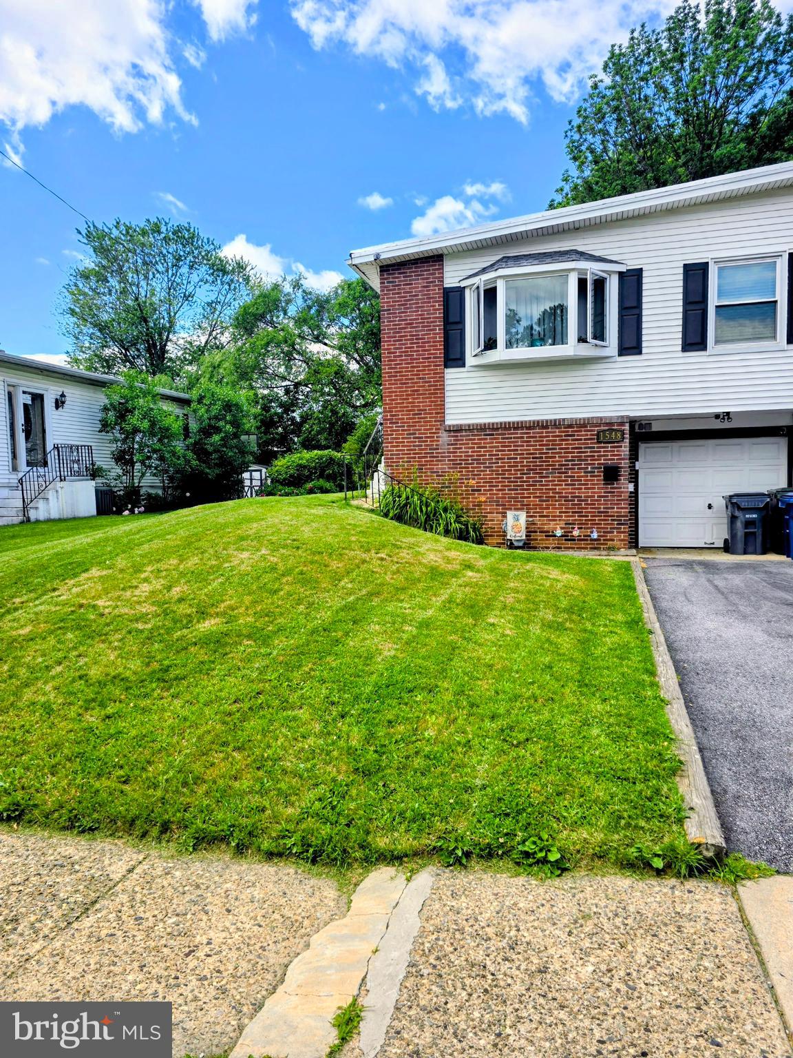 Hello, this is a beautiful and well-maintained property, located in beautiful Abington PA. Come discover this attractive 3-bedroom, 1.5-bathroom property,  with spacious living space, dining area, and hardwood flooring; along with sliding doors leading to a large backyard , with a brand new deck (2025). There are lots of upgrades to this property, the front door  was replaced 2021 (has a life time warranty that is transferable), the windows throughout were replaced (2021). The kitchen has granite countertops, stainless steel appliances, a gas range, a tiled backsplash and newly updated dishwasher/microwave (2024). Downstairs, offers a finished basement with family room, and half bathroom; along with a separate laundry room. The attached car garage is furnished with an updated garage door and is currently being used for additional storage. The Backyard shed provides more storage space. With close proximity to The Willow Grove Mall (3 minutes away), and Crestmont Park,  provides many options for shopping or entertainment. Schedule your  showing and make an offer, for your new home.