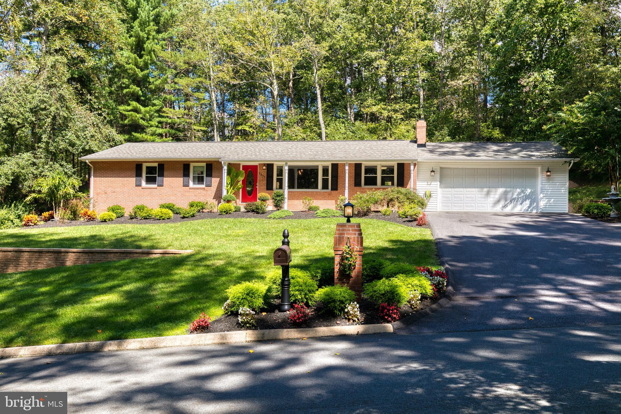 Absolutely gorgeous, updated Crownsville home on a large partially wooded lot with picturesque views, attached oversized garage and a backyard that is a sports lovers dream! From the moment you walk in the front door, you are welcomed with a lovely layout, large windows that flood the house with natural light, fresh neutral paint, and many modern finishes. Stunning kitchen with one year old granite counter tops and high end stainless steel appliances. The main level provides 3 generously sized bedrooms. The owners suite includes two closets and an updated full master bath. The one year new hallway bathroom is updated with new fixtures, a vanity, and LED vanity mirror. The expansive lower level features additional storage space, a full bath, an area for personal gym and plenty of rec room space for activities, movie nights, and more! Lower level provides walk up access to the backyard. The backyard includes a fire pit, large patio with plenty of room for seating and entertaining, professionally installed turf, and regulation half basketball court with hoop! For your convenience, a storage shed is located on the side of the house. Plenty of parking in the attached garage and driveway along with directly in front of the house! The home is tucked away in an established neighborhood close to literally everything! Close to major commuter routes, restaurants, and shops! Check out this beauty today!