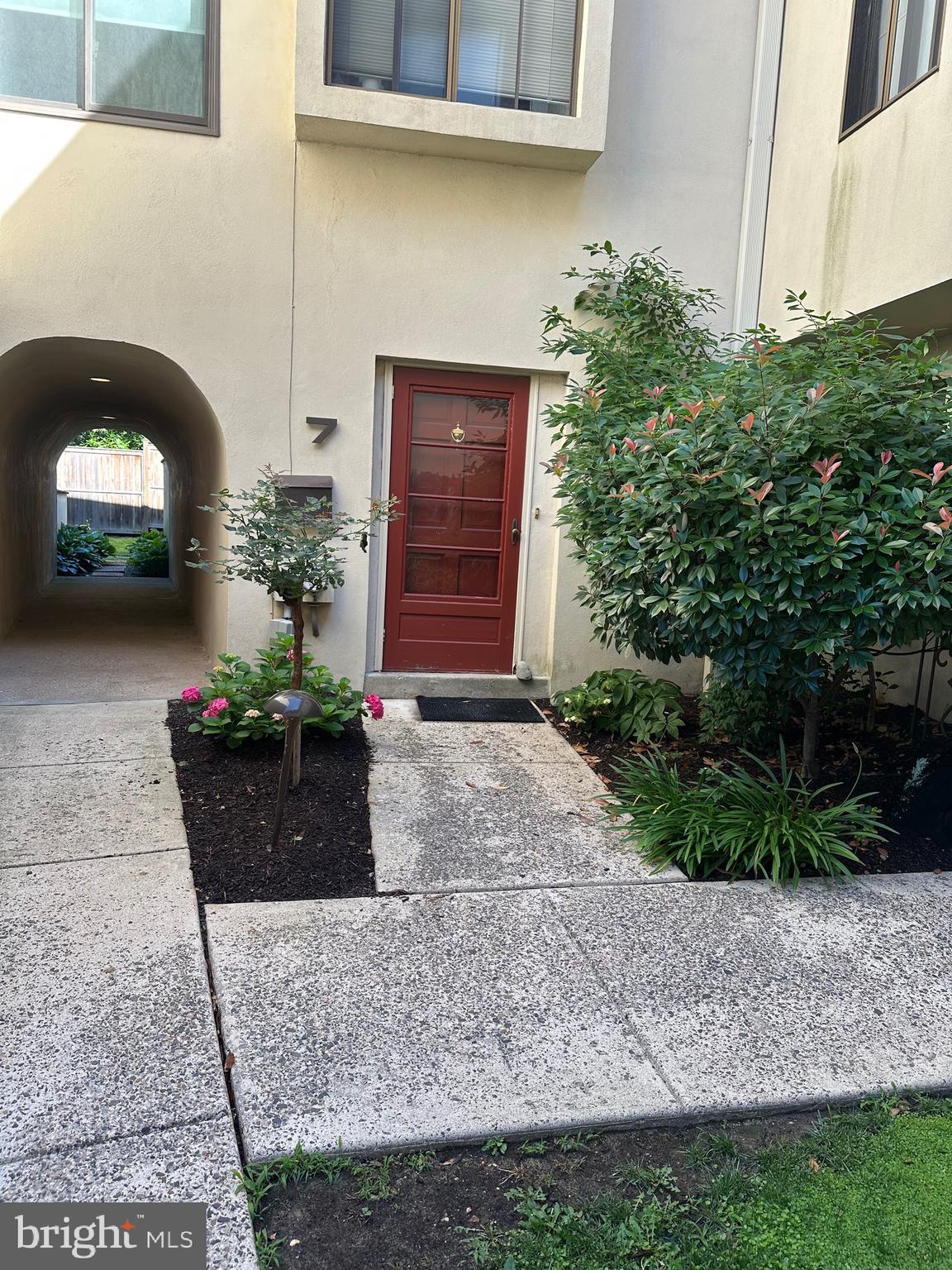 Look No Further! Spacious 3-story corner townhouse offering over 2,800 square feet of comfortable living space. The main level features a sunken living room, formal dining room, and an updated kitchen with wood cabinetry, granite countertops, tiled backsplash, stainless steel appliances, and a Sub-Zero refrigerator;  a powder room. and closets complete the firs level.  The primary suite includes a walk-in closet and a tiled ensuite bath with vanity and stall shower. A loft with custom built-in cabinetry overlooks the living room, adding flexibility for a home office or sitting area. The third level offers three additional bedrooms, a full hall bath, and a laundry area with full-size washer and dryer. Enjoy outdoor living on the wraparound patio surrounded by mature landscaping and extensive plantings. Many recent improvements including newly installed carpeting in bedrooms and hall, new microwave , dishwasher, and luxury vinyl flooring in kitchen,  interior painting, new storm door, 50 gallon hot water heater- 1 year , HVAC 4 years. Parquet flooring on. 
 Ideally located close to shopping, dining, and transportation.Welcome Home!