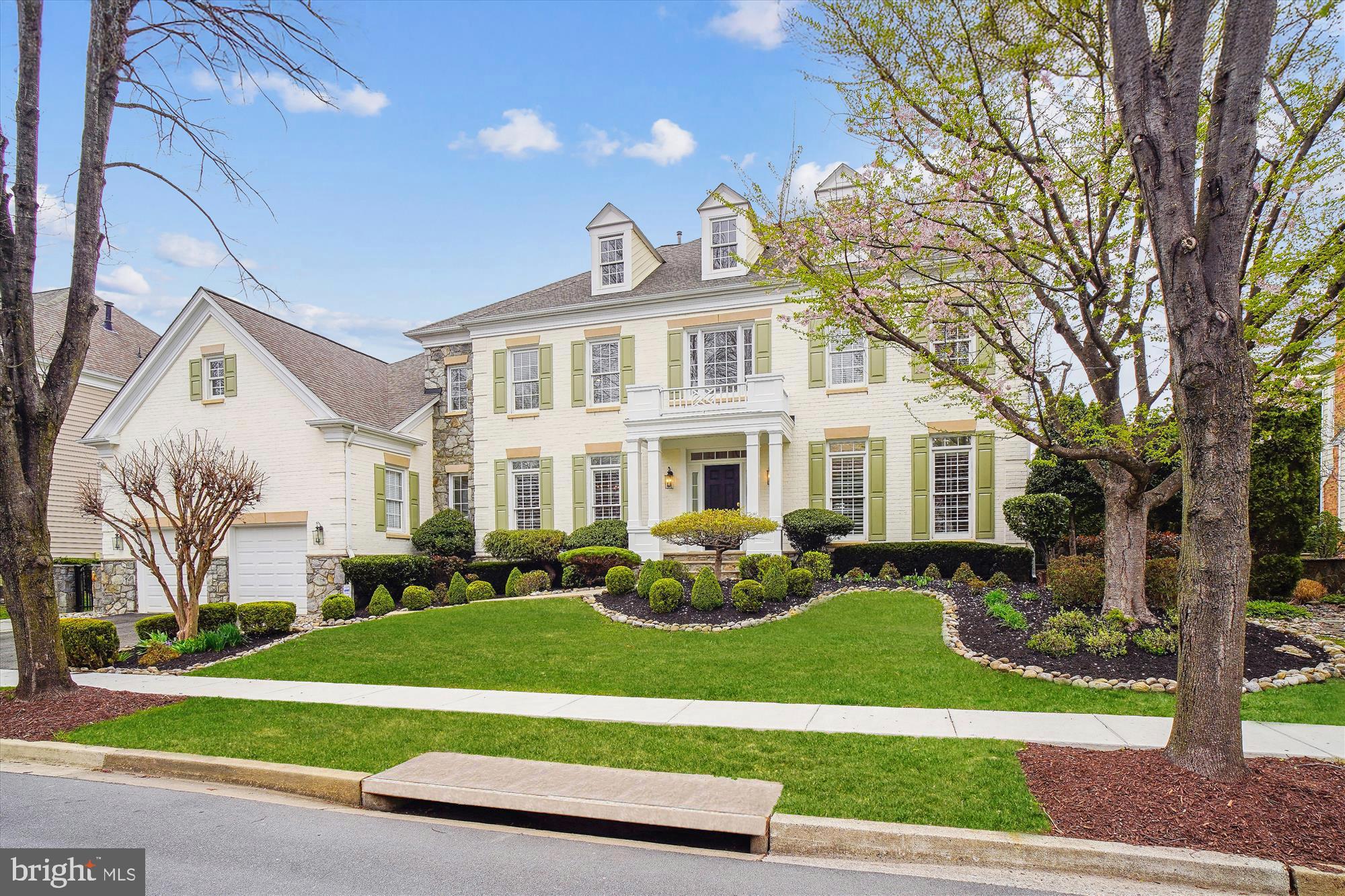 Welcome to 103 Prettyman Drive, a stunning home nestled on a picturesque street in the highly desirable Fallsgrove community. This meticulously crafted Pulte-built Chatsworth model boasts an array of sophisticated upgrades and finishes. With 7,664 total square feet, the home offers 5 spacious bedrooms, 5.5 bathrooms, and expansive living spaces, including a fully finished walk-up basement with a kitchenette.
Key updates include a NEW ROOF (2019), ATTIC INSULATION REPLACED (2024), ATTIC SEALED (2024), NEW ZONED HVAC UNITS (2021, 2017), NEW FURNACE (2020), NEW HOT WATER HEATER (2021), BASEMENT REMODEL (2018), YARD REGRADED & SUMP PUMP INSTALLED (2018), NEW CARPET (2025), NEW COOKTOP AND DOWNDRAFT (2025), and NEW WASHER/DRYER (2021).
Elegant finishes and modern comforts define this exquisite residence. A grand two-story foyer with a graceful chandelier welcomes you, while extensive millwork, hardwood floors, recessed lighting, high ceilings, plantation shutters, oversized rooms, and multiple walk-in closets enhance the luxurious feel. The exquisitely curated landscaping features a large flagstone patio, a cherry blossom tree, a crepe myrtle, rose bushes, and vibrant seasonal blooms, creating a serene outdoor retreat.
At the heart of the home, the expansive gourmet kitchen shines with granite countertops, a center island with a breakfast bar, a 5-burner gas cooktop with downdraft, two wall ovens, a butler’s pantry, a wine refrigerator, and a sunlit breakfast area with walkout access to the backyard. The kitchen opens to a cozy family room with coffered ceilings and a striking stone-accent fireplace. The main level also includes an elegant foyer, formal living and dining rooms, a private office, a powder room, and a mudroom/laundry room.
Upstairs, you’ll find four bedrooms and four full bathrooms, including a luxurious owner’s suite. This retreat features a spacious sitting/entertainment room and an enormous walk-in closet with three separate sections, each outfitted with custom organizers. The spa-like owner’s bath offers a jetted Jacuzzi soaking tub, a walk-in shower, dual vanities, and a private water closet.
The walk-up lower level provides abundant flexible space, perfect for a recreation room, home gym, or game room. Additionally, this level includes a kitchenette, a bedroom, and a full bathroom—ideal for an in-law or guest suite.
Prime location! Conveniently near shopping, dining, and entertainment hotspots, including Downtown Crown, Rio, and Fallsgrove Village Center. Just minutes from Shady Grove Hospital and the Universities at Shady Grove. Perfect for commuters with easy access to major routes. Top-rated Montgomery County schools enhance the appeal.
Fallsgrove HOA amenities include a pool, clubhouse, and fitness room. Don’t miss the opportunity to own in one of the DC area’s most sought-after communities!***Full photoshoot coming Thursday or Friday.***