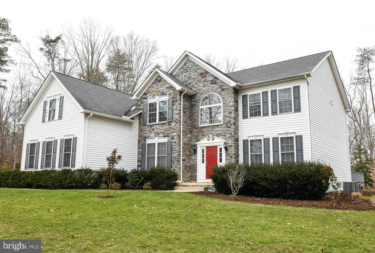 Lovely Oxford model with open floor plan and dual staircases. Private 2 acre lot, backs to trees in desirable Forrest Farm. Gourmet kitchen with island, DBL oven and granite countertops, adjacent large family room and sunroom with lots of windows for natural light. Beautifully finished basement with large rec. room, separate theater room, gym and large storage areas.