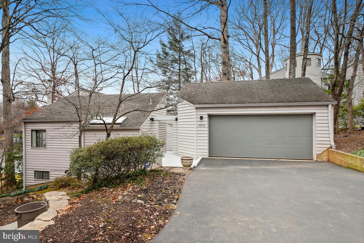 Welcome 2024 with the opportunity to own this spectacular home! Here you will enjoy not just the soaring architecture but also gorgeous sunsets and amazing lake views!It's as if all of Lake Audubon is right behind the house with side-to-side, endless views! From the gleaming hardwood floors to the Main Level Primary Bedroom to the multiple decks, there is so much to love here! The dramatic open floor plan allows for you to utilize the space to best suit your lifestyle. The many sliding glass doors open to year 'round vistas over the water! This home is perfect for indoor and outdoor entertaining! The access from the garage to the house creates a private oasis to welcome you home.  Everything you need is on the Main Level - and then there's more on the Lower Level-three Bedrooms, two full Baths, and Rec Room space! Even though this home feels like a vacation away from it all, it's in a convenient location near Reston Town Center, major commuting routes including Metro and is a short drive to Dulles International Airport. Skylights! Soaring Ceilings! Expansive Decks!   This is truly one where you may enjoy your visit, but you will love coming back to live!