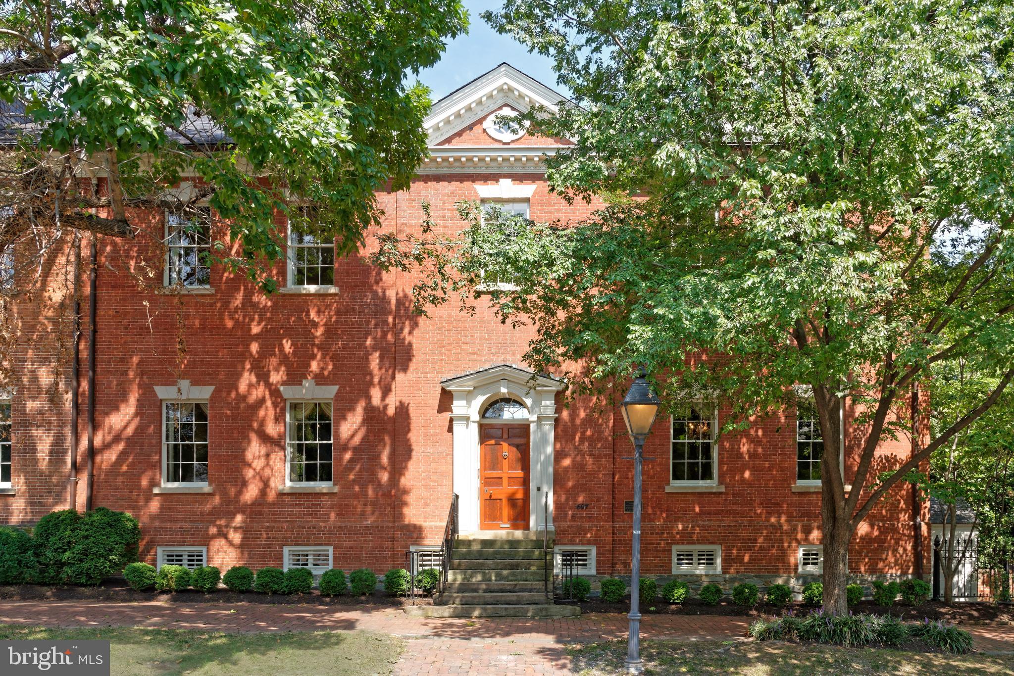 A rare offering, the Potts-Fitzhugh-Lee House resides on a half-acre double lot in the heart of Old Town Alexandria. The grand entrance greets you to a storybook foyer with magnificent architecture juxtaposed with historic period details and natural light creating both a majestic yet warm scene. Beyond the entry, the main level offers ideal settings for unforgettable entertaining with an oversized great room, stately dining room, and gourmet kitchen. Designed with traditional elegance, this timeless estate is light, bright, and open throughout. The unique, expansive primary suite is the perfect escape that boasts a custom dressing room and spa bath with dual vanities and a soaking tub. The home features five additional bedrooms and four additional bathrooms. Equally impressive, outside the home, the verdant garden awaits. With patios, countless specimen trees and lush grounds, this estate is truly magical. Just through the garden, you will find the bonus, detached two-car garage and studio space. Significant renovations and professional restorations over the years have been completed with great attention to detail.  This masterpiece for the most discerning buyer is  located on a quiet, charming block steps to the Mt. Vernon Trail, the Potomac River, shops and restaurants on King Street, and easy access to National Airport, Metro, Amazon HQ2, and major commuter routes.