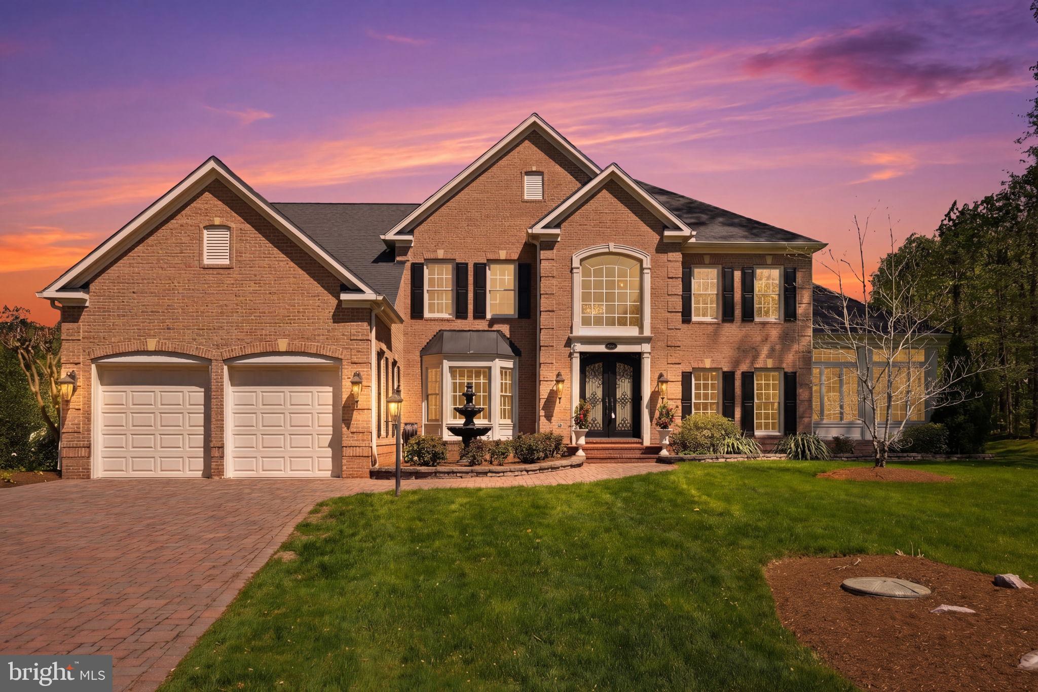 Welcome to 206 May Lane — a stunning brick colonial offering over 7,000 square feet of thoughtfully designed living space on a private, wooded lot in the sought-after community of South River Colony. From the moment you arrive, the home commands attention with its striking facade, sweeping paver driveway, and show-stopping solid iron entry doors that set the tone for everything inside.
The heart of the home is a newly renovated chef's kitchen that is nothing short of extraordinary — custom cabinetry, a dramatic quartz island, designer chandelier lighting, and an open flow into the family room make this a space buyers will never want to leave. The adjacent conservatory/sunroom is bathed in natural light with walls of windows overlooking the lush backyard and multi-tiered hardscaped patio — an entertainer's dream.
Upstairs, the primary suite is a true retreat. Spacious and serene, it features a sitting area, double-sided fireplace, and a fully renovated spa bath with heated floors, a freestanding soaking tub, frameless glass shower, and custom vanity. Four additional bedrooms, including a Jack and Jill bath and a private en suite, provide flexible living for every lifestyle. A dedicated home office and dual staircases round out the upper level.
The fully finished lower level is an experience unto itself — a recreation room, wine tasting room, home gym, second full kitchen with bar seating, a bonus flex room perfect for a playroom or additional office, and direct exterior access make this level as functional as it is impressive.
Outside, the multi-level hardscaped patio with built-in seating walls, fire pit area, and mature tree-lined backdrop creates a private outdoor sanctuary.
Fresh paint and new carpet throughout the second floor. Every detail has been considered — this one is truly move-in ready.
Nestled within the award-winning South River Colony, residents enjoy a lifestyle that is hard to match — approximately 300 acres of wooded preserves with walking trails, two pools, tennis courts, and playgrounds Southrivercolony, all just minutes from the community's own town center with shops, dining, and professional services. The Golf Club at South River is a private club with membership available to residents. Just six miles from historic Annapolis and 35 miles from Washington, D.C., the location is as compelling as the home itself.
This is the one you have been waiting for — where luxury, lifestyle, and location come together without compromise.