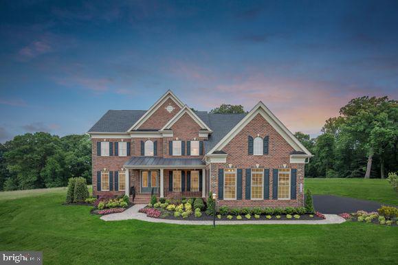 Welcome to Greystone by NVHomes , a community that more than 90 people have already decided to call home! The Estate Homes at Geystone feature 28 luxury estate homes nestled among lakes, trails and a nature preserve near the West Chester Borough. Homesite 25 is a Clifton Park II boasting 5,000+ sq. ft. of living space including 5 bedrooms and 5.5 bathrooms. The  grand two-story foyer wows with a beautiful water-fall staircase. Graceful columns set off the formal dining room and two story living room while keeping the floorplan light and open. Past a conveniently placed powder room and coat closet, additional columns define an enormous family room, which is open to the kitchen and is perfect for entertaining. The dinette flows into a kitchen with stunning views and access to your large deck, flagstone patio, and stone fireplace.  The kitchen features two oversized islands, Quartz countertops,  white and gray cushion close cabinetry, and walk-in pantry. Your included morning room offers more kitchen space to spread out and entertain. Off the kitchen is a butler's pantry, family entry with arrival center and laundry room.  The real story of this home is the Owner's suite. Through a double-door entry, you walk into a suite of breath-taking proportions accented by a tray ceiling. The owner's bath is stunning with its soaking tub, dual vanities, separate shower and compartmentalized water closet. Enjoy even more space with your included finished basement and full bath! The media room, home office/exercise room, full bath and wet bar maximize your entertaining space.  Other luxury features of this home include smart home features and a 4 car garage.