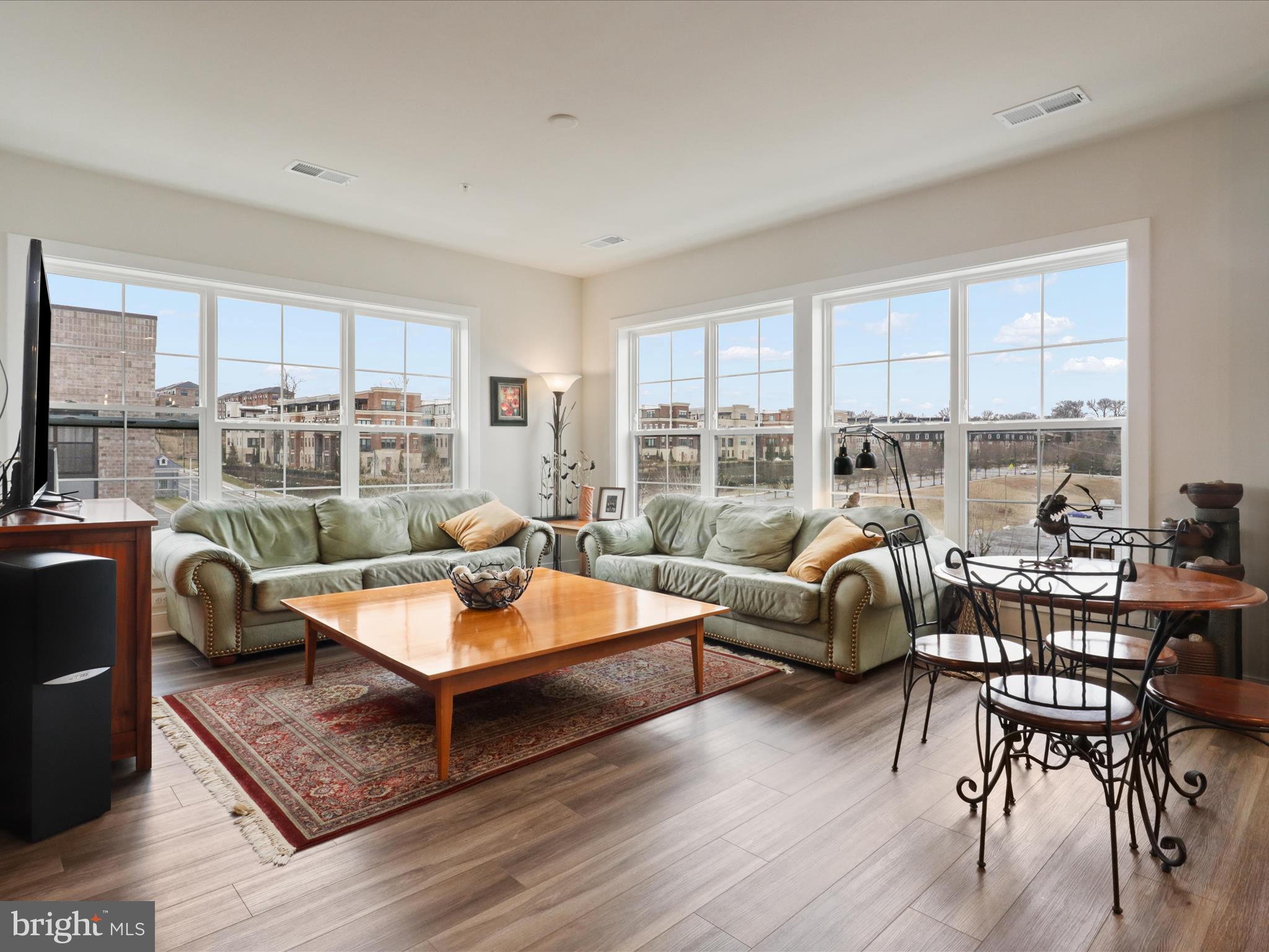 WELCOME TO The Flats at National Harbor - a community that features new, upscale condominium residences in the National Harbor. Choose low-maintenance living in this 1,577 square foot residence featuring 2 bedrooms and 2 bathrooms, and a balcony. Upgraded features include quartz countertops, stainless steel appliances, ceramic tile backsplash, ceramic tile floors in the owner’s bathroom, and luxury vinyl plank flooring. Start your day in the gourmet kitchen and unwind on your private balcony. The home design features a combined kitchen, dining and living room, maximizing your entertaining space. This new construction in 2024, one-level elevator condo offers an open concept home design and an assigned parking space (space #6) in the secured parking garage. Come home to the heart of it all at The Flats at National Harbor, the perfect place to live, work, and play. Head to downtown National Harbor to grab a bite to eat or shop with friends. Take a spin around the harbor with Capital Bikeshare or jump on a water taxi to cruise over to Washington, D. C. or Alexandria. Reconnect with nature and enjoy time outdoors with beachfront walking trails, waterfront piers, and Topgolf. Live steps away from the energy and excitement of the Waterfront District at National Harbor, you’ll never run out of things to do. One Entrance - One Exit to town - AND 40 Restaurants within the 300-acre town - you'll never run out of things to do!