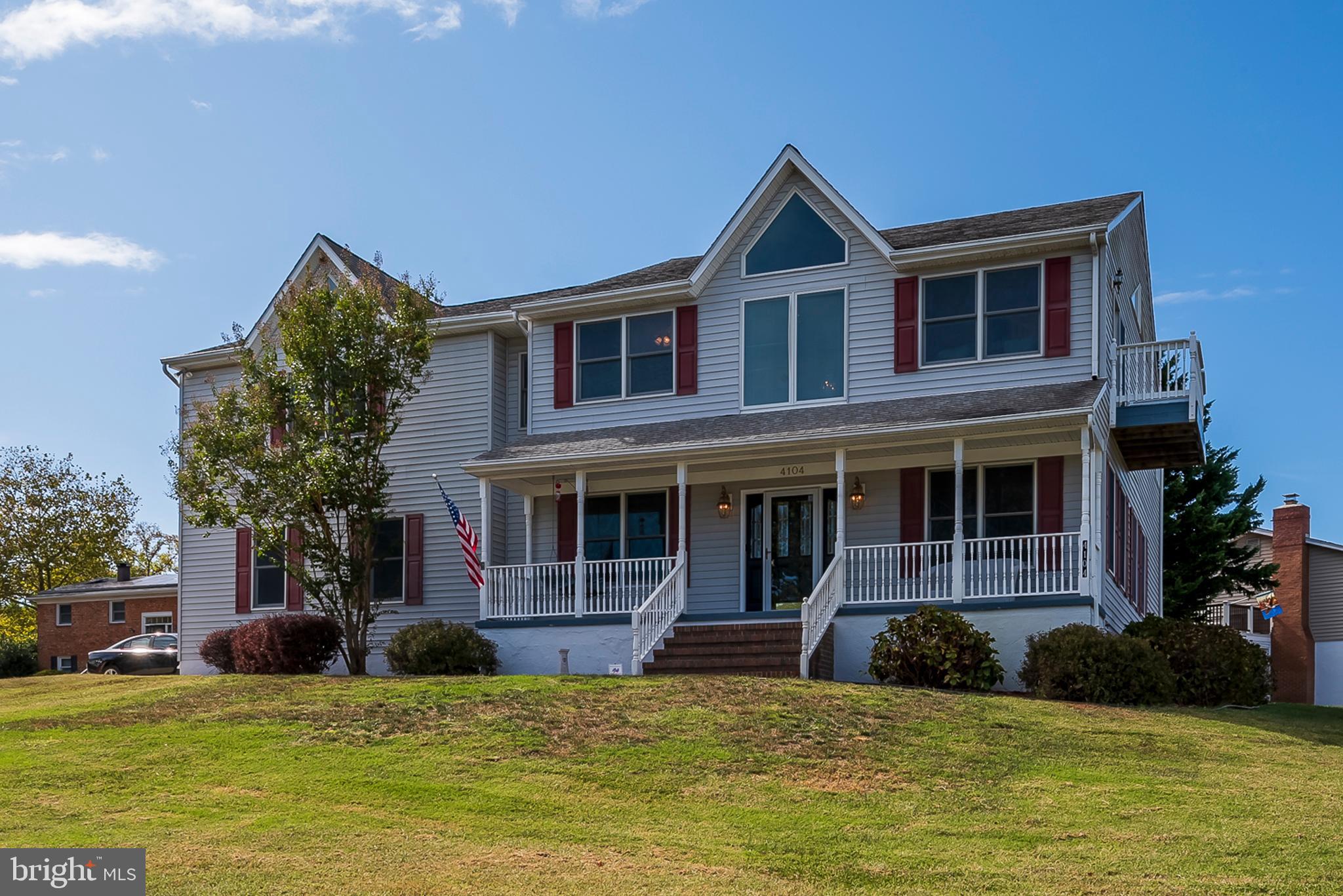 This large home has new paint and carpet and offers over 3100 sq. ft of living space. 4 bedrooms, 2 full baths and 2 half baths makes this home an entertainer's delight.  Main level has hardwood floors throughout. Kitchen has granite counters, tile backsplash and gas stove. It is open to the family room with wood fireplace. Oversized 2 car garage allows access to the mud room or back yard.  Concrete driveway has parking for 6 cars plus parking pad for your trailer, boat or RV.  4' vermiculite pool is great for basketball, volleyball or relaxing with a drink in your hand. Back yard is fenced in with mature trees to enjoy privacy in your pool and on the deck.   BONUS room above garage is over 600 sf with half bath and office nook.  Great space for the kids, man cave or party central.  Pool table conveys.  Home is being sold as is but many updates in the last 3 years include: hot water heater, two HVAC units, 500 gallon underground propane tank. Public Marina for your boat is steps away.