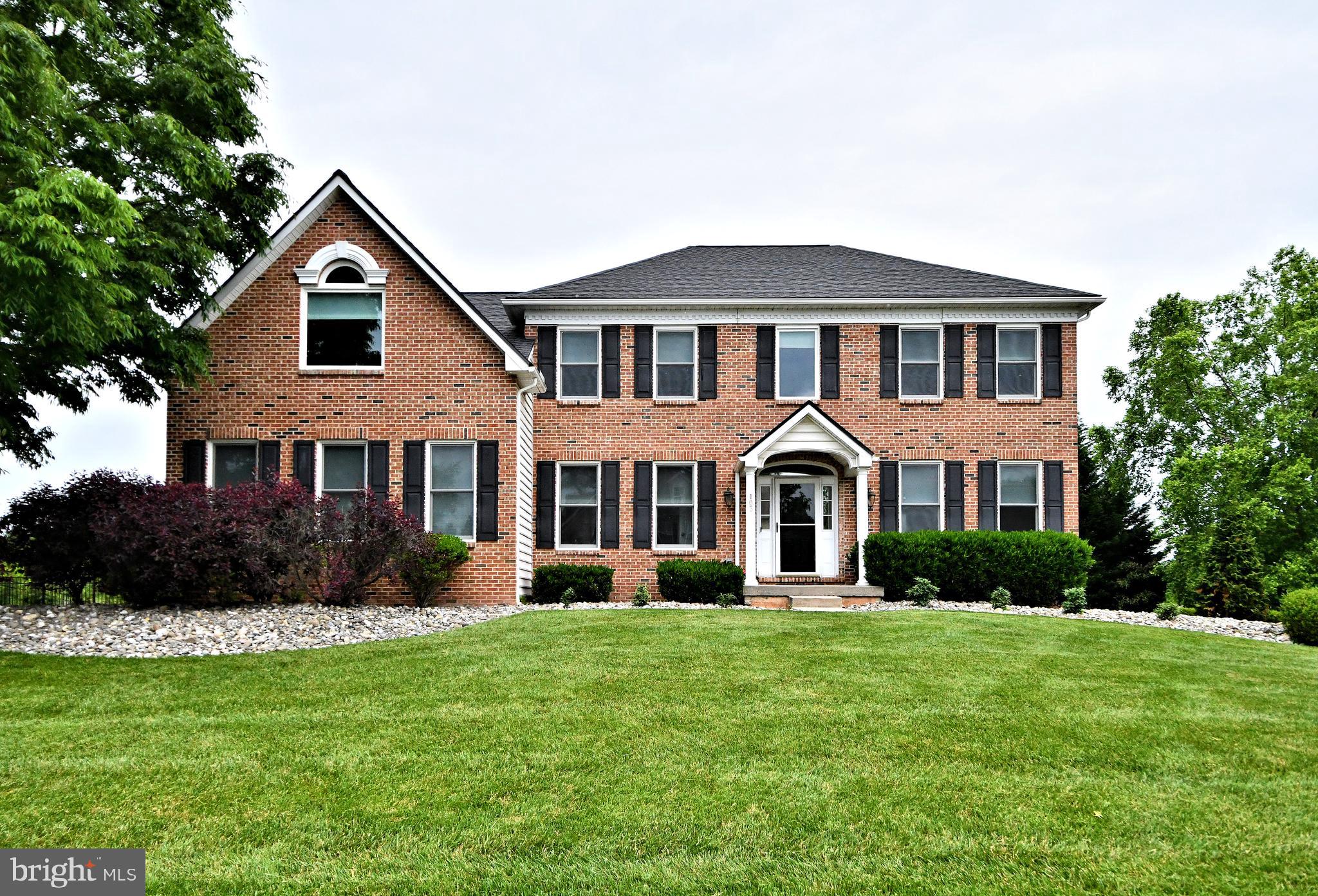Magnificat Brick Front Colonial that you will simply need to see in person to truly appreciate properly! From the second you exit your car, you will understand what's about to come. Enter into the two story foyer with new hardwood flooring and an upgraded chandelier. Your tour starts with an in-home office with double privacy door, hardwood flooring, high ceiling, and great natural light from the front windows. To the right of the entry way, you have the formal Living room (currently used as a Dining room) and the formal Dining room, used as a second home office. Both have great wood accents and are well sized! And then? That Kitchen. Wait until you see this masterpiece. The current owners had the entire kitchen completely redone with a cost of almost 200,000 (May 2022). Gorgeous top of the line cabinets (Omega), Stainless appliances (Wolf, Subzero, Cove), a built in coffee bar (Miele), and more. Subway back-splashing,  new Kitchen window overlooking the fabulous rear yard, granite counters, and the list goes on and on. A full eat in area with sliders to the rear deck, and a large Family room with tons of windows, vaulted ceiling, gas fireplace...and get this, New white oak flooring was installed in the Foyer, Office, Kitchen, and Mudroom to match what was there (and also, Dining, Living room and upstairs hall floors were sanded and redone!) A powder room and Mudroom complete this floor perfectly. 
The second level has 4 well sized bedrooms including the Owners Suite with a massive sitting room, Tray and vaulted ceilings, 2 closets, an additional full sized walk-in closet with a large window and built-ins), and  an Owners bath with large soaking tub, double sink and stall shower! 
The second floor full hall bath was also, yes, entirely redone! 
Need even more? How about the fully finished lower, walkout level, with great lighting, a well sized exercise room, laundry room, media room, a second Family/Bonus room with wet-bar and two built in wine refrigerators, plus a full bath! 
The rear yard is completely fenced in, level, and has a deck overlooking the grounds, plus a massive patio allowing for tons of outdoor entertaining and a built in Jen Air Grill. 
Additional features include two new HVAC systems (2022), ALL new windows (Renewal by Anderson May 2024, approx. 85,000 cost, with remote control shades for the Family room, and newer shades throughout the rest), black aluminum fencing (Nov 2021), Generator transfer switch in 2021 plus additional electric upgrading), and landscaping upgrades including River Rock and 15 Arborvitaes planted for added privacy. 
Whew! That was a lot to read, but trust me, there is much more to see and appreciate, including a 50 year roof installed (2020), the 3 car attached garage, off street parking, and great location, close to many major roadways but tucked away from it all. 
You may never have a chance to own a home this well done again, so DO NOT miss this one!