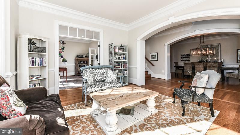 For those interested, offer review scheduled for 1/27 11 AM. Impressive, charming & distinctive Arts & Crafts style North Arlington stunner on corner lot. Arguably one of the most convenient and friendliest locations in the DMV. Also, 1 block from nature trails and creek; you'll never know you are inches from DC. 10 foot ceilings, open archways, moldings, wainscoting and other impressive details. Panoramic views of the neighborhood, architecture is stunning. Lavish owner's suite w/ sitting room. Gorgeous finished 4th level w/a range of use possibilities to fit your life/family needs complete with a  full bath. Also, home boasts an above ground, walk-out lower level complete with an au-pair suite and home theatre. Multiple outdoor decks and patios offer privacy and enjoyment for all seasons. 3 car garage, ample storage and mudroom too. Unconfining design & footage combine for real live-ability....a must see!