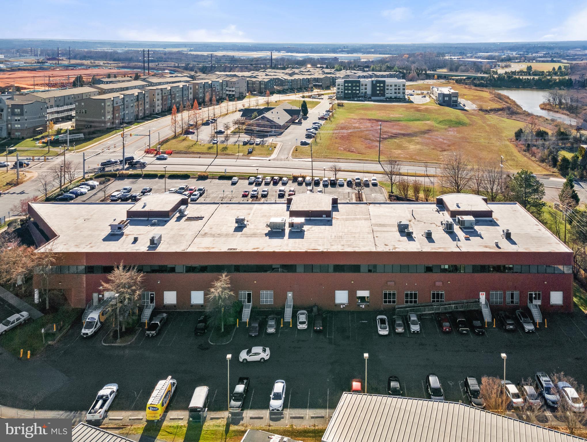 10,928 SF Flex/Warehouse Condo price to sell in Manassas Virginia at $163 psf.  Unit is  fully  air-conditioned with two HVAC units the space includes two 8'x8' loading docks, Verizon Fiber and Comcast Business, wide open production area with multiple exhaust fans, 11'7" ceiling heights, 600 amps of power, conference rooms and six offices.  Zoned I-1 (light industrial in City of Manassas). Ideal for brewery, laboratory, light manufacturing, R&D, warehousing and distribution.  Building has easy access to US-29, Prince William Parkway and I-66.  Located near Manassas Airport.