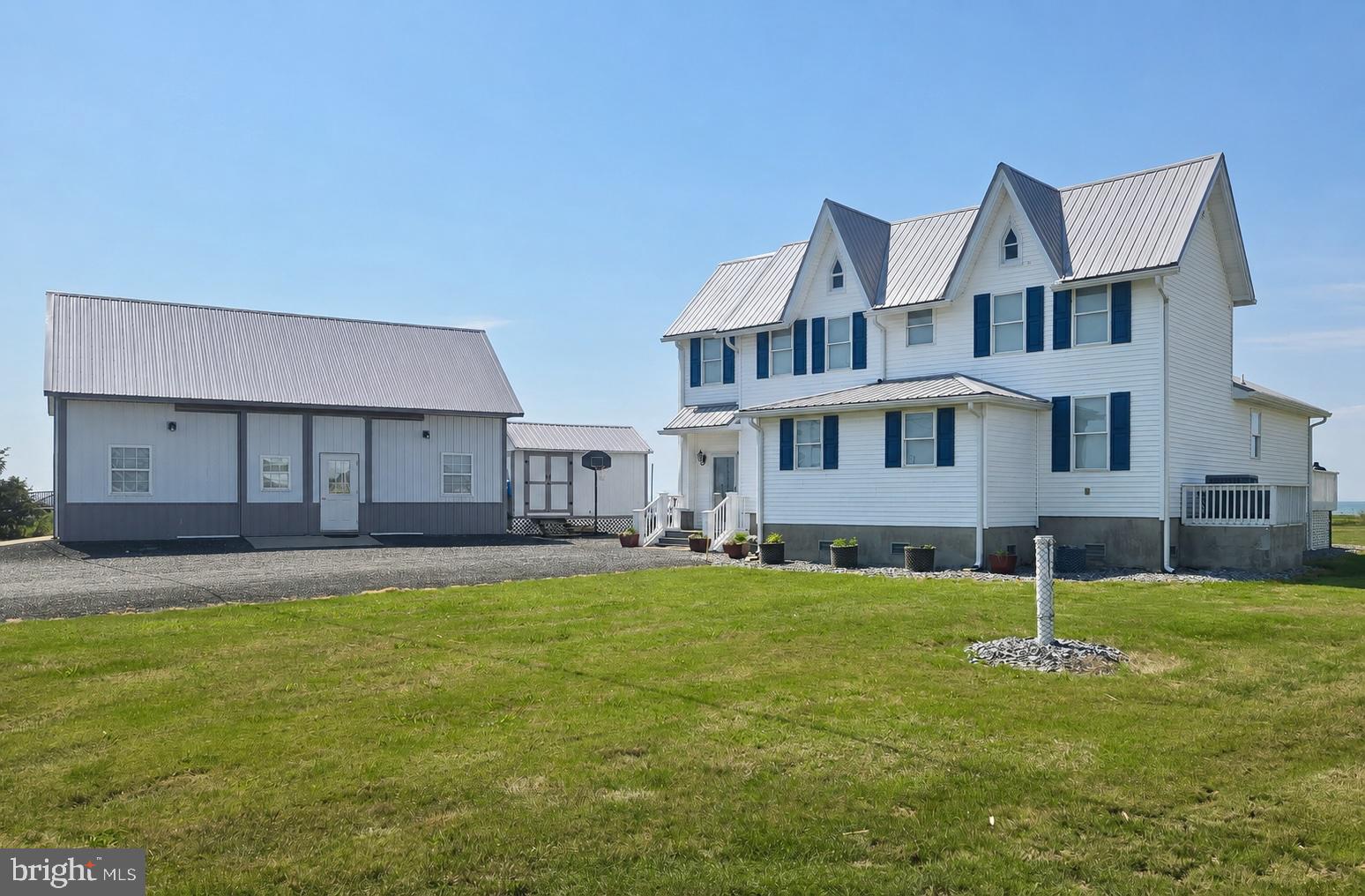 Enjoy coastal living in this updated 4 bedroom, 2 bath waterfront home with stunning sunrise and sunset views over the Honga River and Chesapeake Bay. Bright and inviting with comfortable living spaces, cathedral ceilings, this home is ideal as a full-time residence, weekend retreat or airbnb investment. The property features a large pole barn with electric and heating & air, shed, large deck and spacious outdoor landing with fire pit overlooking breathtaking Chesapeake Bay views. Located just across from a marina and public boat ramp, you’ll have easy access to boating, fishing, and crabbing. Newer well and septic plus a fully riprapped shoreline. Bring your golf cart, kayaks and bikes and enjoy all that Hoopers Island has to offer. Nearby favorites include Old Salty’s Restaurant and Hooper’s Island General Store.