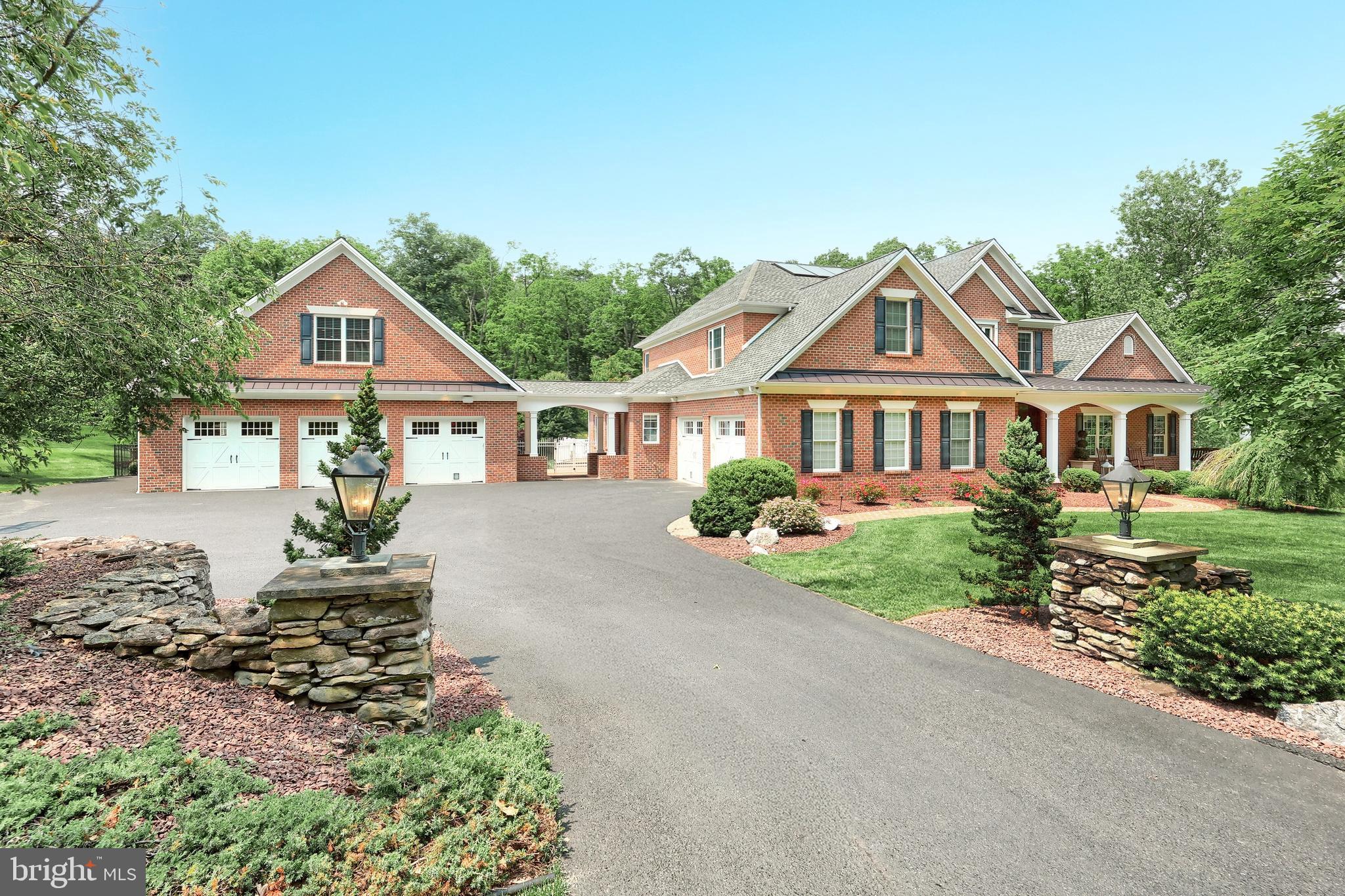 OPEN HOUSE CANCELLED AS HOUSE IS UNDER CONTRACT . 
Welcome to 471 Shady Dell Road, a one-of-a-kind custom-built all-brick estate located in the highly sought-after Rosenmiller Farms community within the York Suburban School District. Designed and built by Jeffrey Henry, Inc., this beautifully crafted home sits on 1.5 private, landscaped acres and offers over 8,700 sq ft of finished living space, plus an additional 1,120 sq ft of finished bonus space above the detached garage. With 6 bedrooms, 5 full and 2 half bathrooms, the layout was carefully planned to ensure every space has a purpose, and no detail was overlooked. The main level features a formal dining room with crown molding, a vaulted family room with wood-burning fireplace, two custom home offices, a Florida sunroom with American chestnut beams, and a fully updated chef’s kitchen with granite counters, Sub-Zero refrigeration, Miele coffee system, warming drawers, and dual dishwashers. The first-floor primary suite includes a spa-like bath with soaking tub, dual vanities, and walk-in closet. Upstairs offers additional spacious bedrooms and a second laundry area, while the fully finished walkout basement functions as an additional level of the home, featuring a second full kitchen, theater room with 7.1 surround sound, fitness area, and expansive recreation space. Outside, enjoy a heated in-ground pool with solar assist and waterslide, a Brazilian Ipe deck, a covered patio with a marble fireplace, and a full outdoor kitchen with Wolf grill and copper hood. A poolside cabana with laundry adds convenience. A newly installed perimeter fence encloses the backyard and pool area—perfect for peace of mind and pets to roam freely. Additional features include 5-zone geothermal HVAC with radiant floor heat (15 zones including garage bays), passive solar water heating, 600 AMP electric service, 20KW natural gas backup generator, a recently upgraded full-home LED lighting, a 16-camera security system, heated 2-car attached garage, detached 3-car garage with finished upper level, and 8+ spaces of driveway parking. A rare blend of function, comfort, and exceptional craftsmanship—this home offers everything you could want in a custom estate.