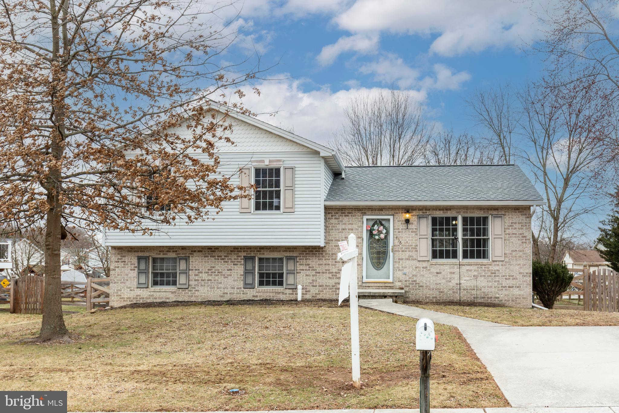 Welcome to this spacious 4 level split home in Littlestown school district.  Nice updates await the new owner. in this 3 bedroom, 2 full and 1 half bath residence.  The main level has a nice kitchen with lots of natural light, updated appliances, new slider to composite deck, LVP flooring and spacious living room.  The upper level bedrooms have LVP flooring and the owners bedroom has a private bath. In the lower level you'll find a huge recreation room w/ a powder room and walk out to the fenced back yard with shed and playset. The lowest level has great storage, utilities and a finished room for your office or 4th bedroom (no egress).  Updates in past 5-6 years:  roof, HVAC, kitchen, deck and estate fence.   We are looking for a patient buyer that has time to allow us to find a home of choice.  Schedule your showing now.