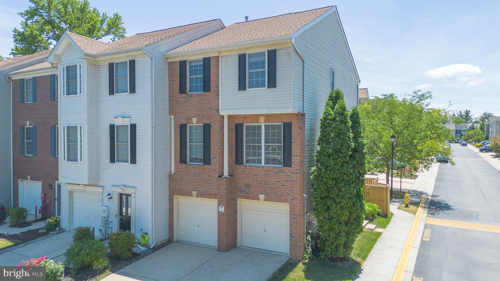 Beautifully maintained 3-level end-unit townhome in Edgewater offering 3 bedrooms and 2.5 baths. This move-in-ready home features a spacious living room, gorgeous hardwood floors, brand-new carpet on the upper level, and fresh paint throughout. Enjoy the benefits of recent exterior upgrades, including a new patio and privacy fence, creating the perfect outdoor retreat. A spacious 2-car garage provides ample parking and storage. Combining modern updates, generous living spaces, and an ideal end-unit location, this home is ready for its next owner!