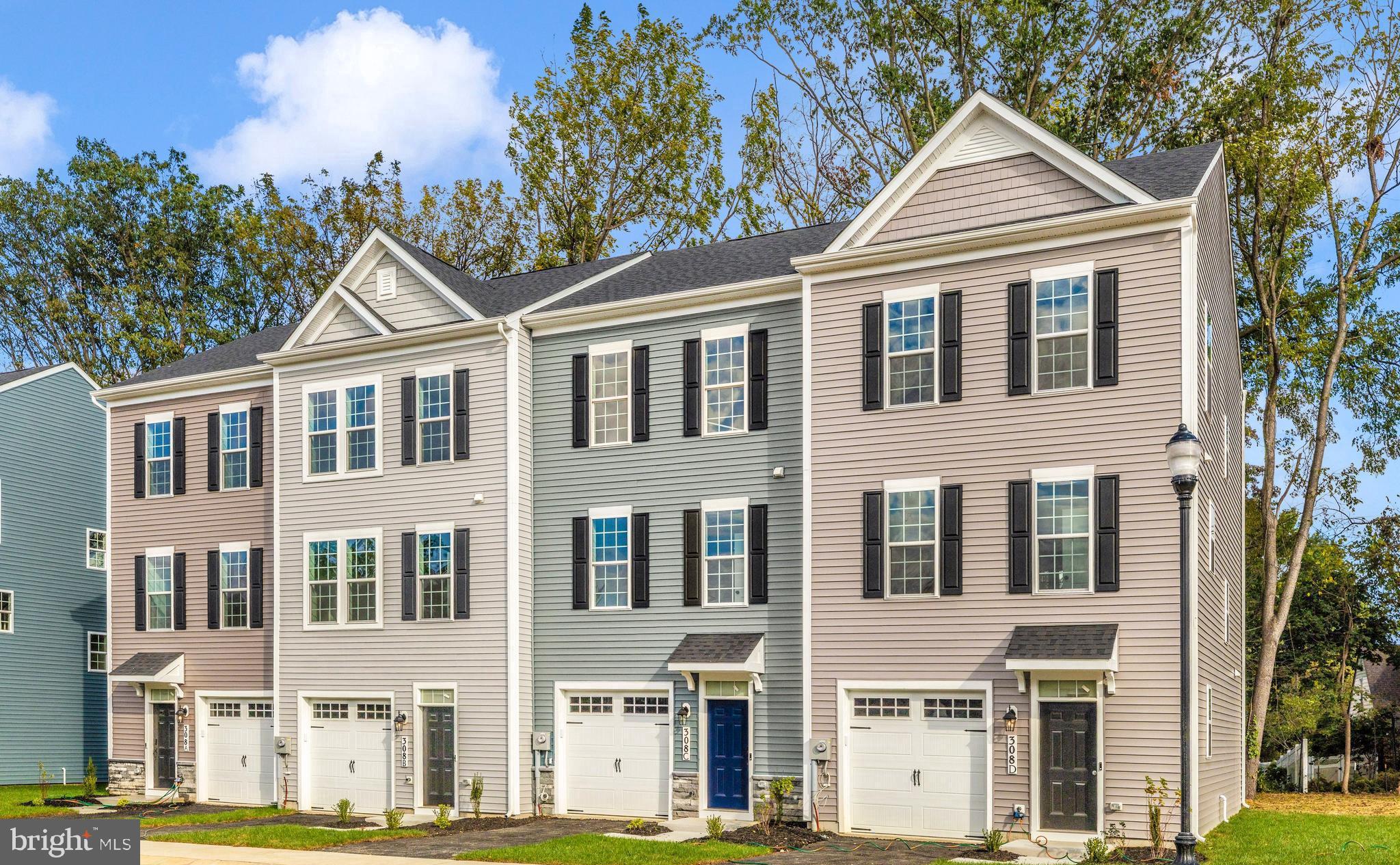 MOVE-IN READY! OFFERING UP TO $12,500 IN CLOSING COST ASSISTANCE WITH THE USE OF THE APPROVED LENDER AND TITLE COMPANY.
Brand-new townhomes at The Woods offer incredible value with three finished levels, 4 bedrooms, 3.5 bathrooms, and a 1-car garage in one of Frederick’s most walkable locations. Enjoy easy access to Baker Park, Rock Creek Park, Downtown Frederick, restaurants, shopping, and everyday conveniences.
The bright, open-concept main level is filled with natural light and features a designer kitchen with quartz countertops, black hardware, and stylish finishes throughout. Modern construction, energy-efficient features, and low-maintenance living make this home an exceptional opportunity for today’s buyer.  Located within the Parkway Elementary, West Frederick Middle, and Frederick High School districts, each home also includes a comprehensive 10/2/1 builder warranty for added peace of mind.
 Photos are representative and may be virtually staged.  Monthly condo fee includes water, sewer, and master condo insurance.