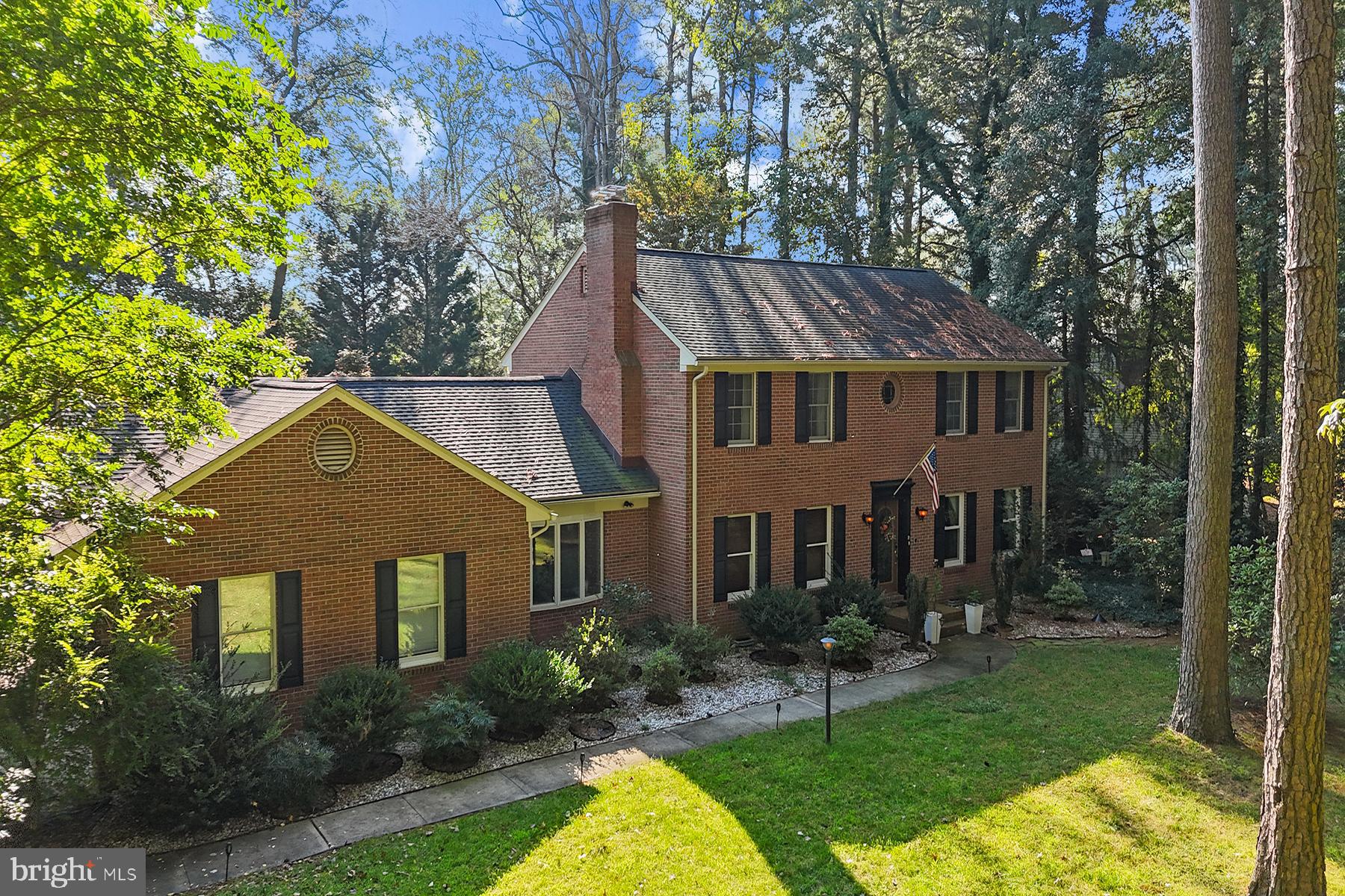 The BEST buy in the neighborhood! Welcome to 5437 Nithsdale Drive, ideally situated within one of Wicomico County’s most prestigious and sought-after communities, just moments from Salisbury’s premier shopping, dining, healthcare, and recreational offerings.  This stately 2 story Brick Colonial is nestled on a large (.72 acre) wooden lot, allowing you to enjoy the nature around you. Exuding both classical charm and practical updating ( newer roof in 2019, geothermal HVAC, brand new underground irrigation lines, and 2yr old motor), the malleable floor plan can be crafted to your liking. Upon entering the foyer you will find two rooms that can be utilized as a living room, office/study, traditional parlor room, formal dining, etc.. The kitchen boasts plenty of space, access to the spacious lanai, and effortlessly leads into what is currently being utilized as a formal living room. The remainder of the 1st level offers another large flex room, 1/2 bath, laundry area, and 2 car attached garage complete with workbench/storage shelves. Upstairs features both secondary bedrooms in addition to the prestigious primary bedroom. This owner's suite has it's own dedicated fireplace, luxurious ensuite bath, walk-in closet, and bonus room for additional storage. While the front yard features primarily mature trees, the backyard is a different story. Great for entertaining, it features include a large enclosed porch overlooking an expansive hardscape patio, open space, and Amish Built Shed. Nithsdale HOA provides a community boat ramp with access to the Wicomico River, playground, tennis, and basketball courts. Reach out with any questions or to schedule a private tour