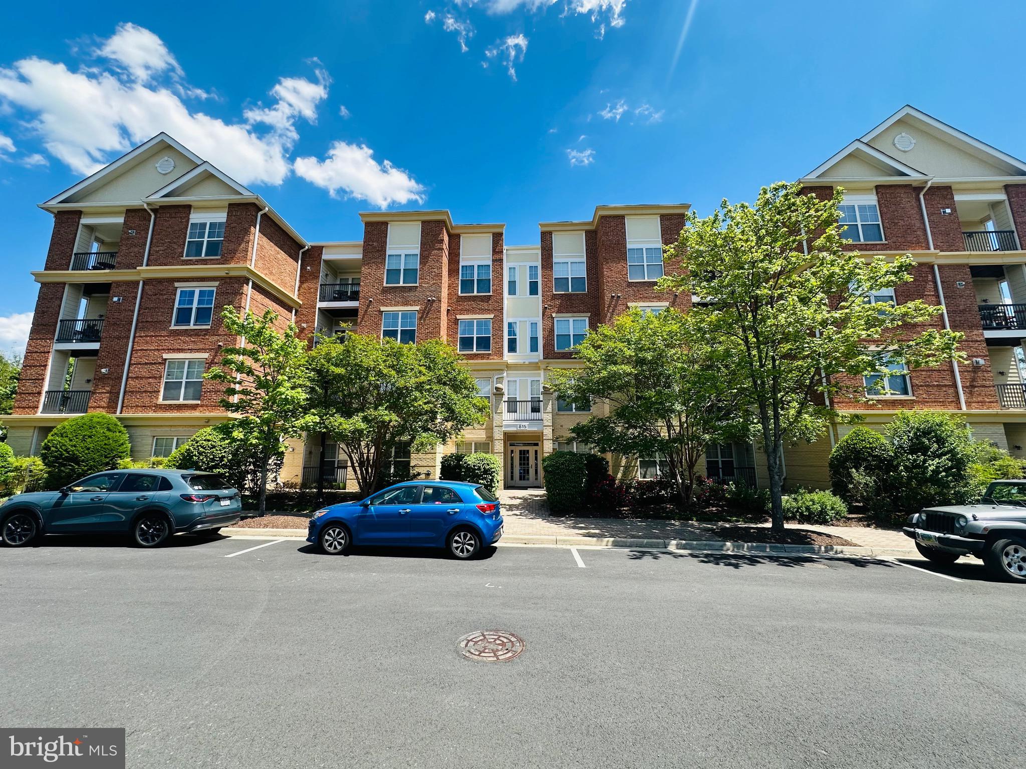 Beautiful top-floor 2 bedroom, 2 bathroom condo in the heart of historic downtown Herndon!
Welcome home to this sun-filled, well-maintained top-floor condo offering nearly 1,300 square feet of stylish, comfortable living in a secure building that includes elevator access. Featuring an open layout with designer paint, hardwood flooring throughout, updated lighting, and a cozy electric fireplace, this home is both inviting and move-in ready. The spacious living and dining areas flow seamlessly to a covered balcony, where you can unwind while taking in charming views of downtown Herndon; perfect for morning coffee, evening relaxation, or enjoying the vibrant surroundings. From this top-floor vantage point, enjoy a unique perspective of the historic district and its lively atmosphere. The gourmet kitchen includes gas cooking, a breakfast bar, and ample cabinetry. Both bedrooms are generously sized, each with walk-in closets. The primary suite features an en-suite bath with a separate tub and shower, creating a true retreat. Additional highlights include high ceilings, crown molding, in-unit washer and dryer, abundant storage, and one reserved secure parking garage space plus ample guest parking. Recent upgrades include newer windows (2024),  HVAC (2019), water heater (2019) and fresh paint throughout (2026). Located directly across the street from the Herndon Library, local brewery, and Town Green, with shops, restaurants, coffee spots, music, festivals, and entertainment just steps away. Enjoy direct access to the W&OD Trail, nearby parks, and quick connections to Reston, Tysons, DC, and the Silver Line Metro. Condo fees include water and trash. FHA and VA approved. A rare opportunity to own in one of downtown Herndon’s most desirable and walkable locations; this home is ready for its next owner.