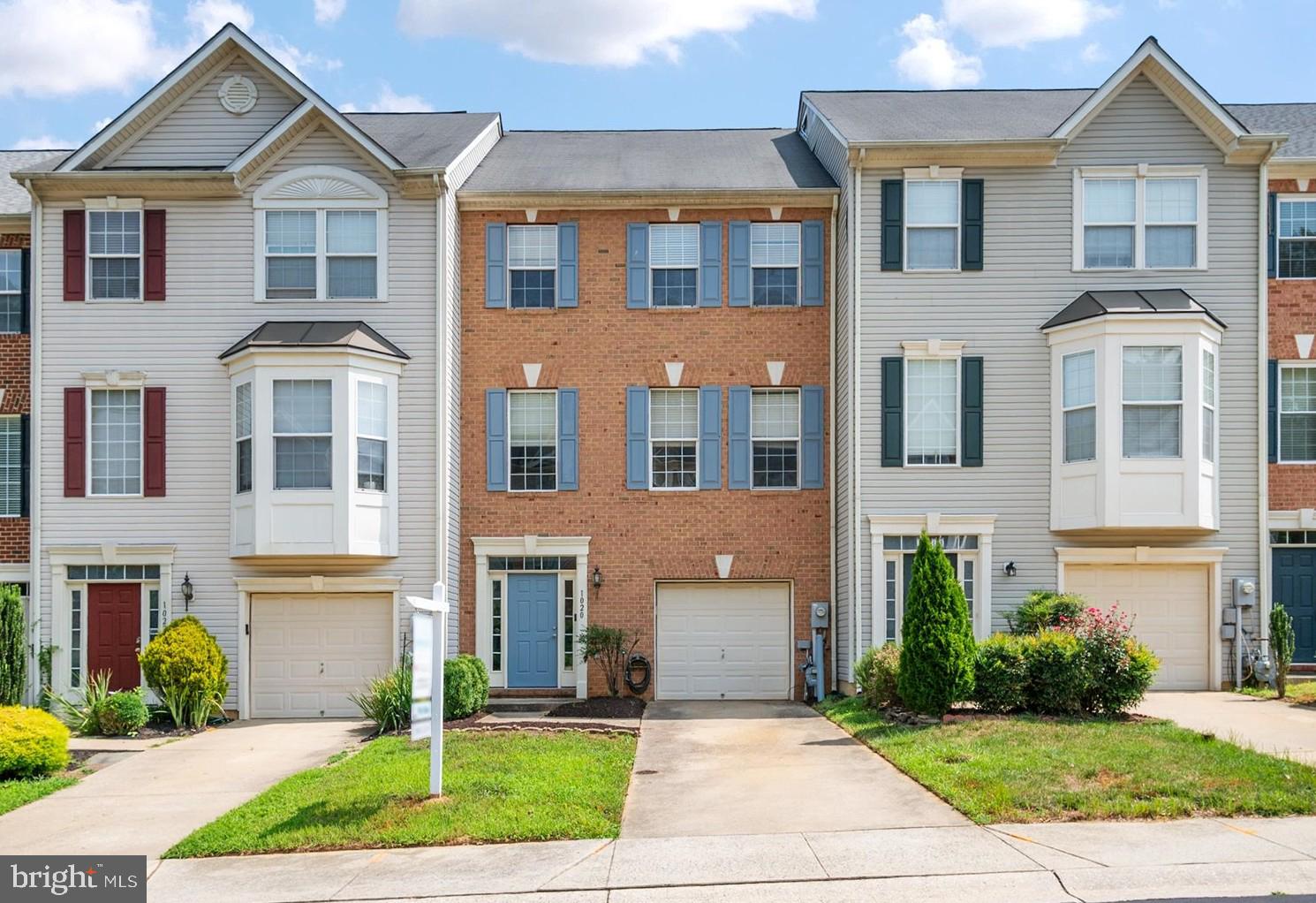 This bright & spacious townhome is as clean as a whistle and ready for you to move right in! The ground floor boasts a welcoming entry foyer, a large family room with a fireplace, a bonus half-bathroom and a convenient one-car garage. On the second floor, you’ll find a mammoth living room, a sunny dining area, and a kitchen with stainless-steel appliances, gas cooking, a prep island and tons of cabinetry. The upper floor of the home offers a relaxing master bedroom suite featuring a large walk-in closet and a tile bathroom with a double vanity, a stall shower and a separate soaking tub. Outside, you’ll enjoy a rear deck and a fenced backyard. Recent updates to the home include fresh interior paint (2026), the HVAC system (2024), the gas stove and toilets (2022) and the dishwasher and washer & dryer (2021). The home is located on a dead-end street in the heart of Piney Orchard -- a vibrant and welcoming community that offers a wealth of wonderful amenities, including miles of walking & biking trails, 3 outdoor pools, an indoor pool, athletic fields, tot lots, a community center, a fitness center, excellent schools and close proximity to dozens of dining, shopping and entertainment options. See this great home today before it’s gone!