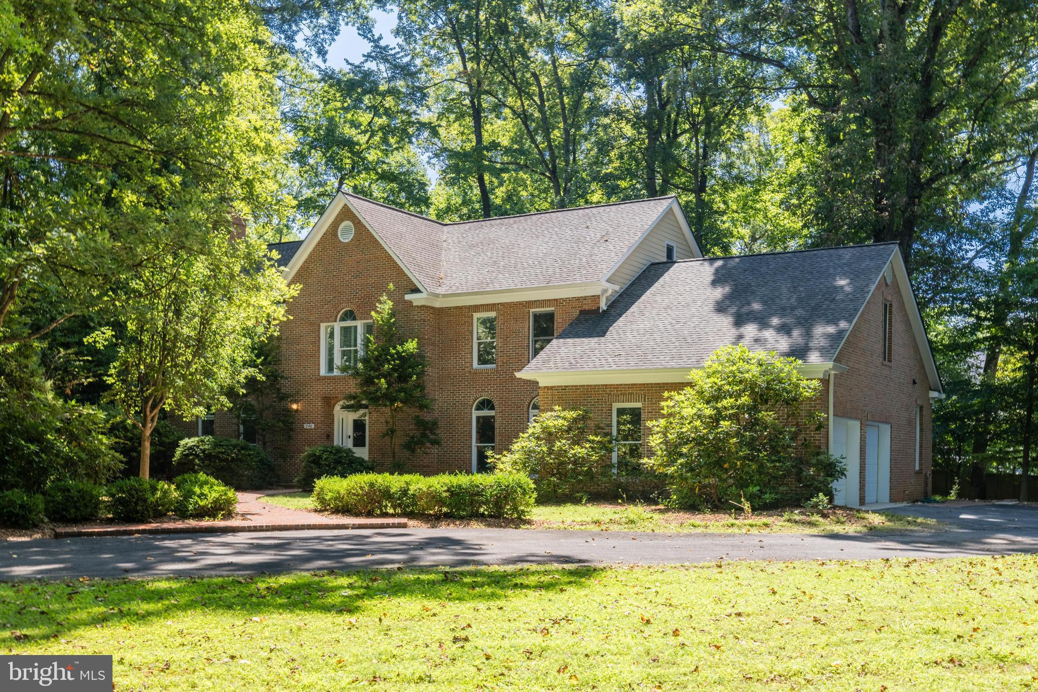 Welcome to your dream home! Nestled at the end of a tranquil dead-end road, this elegant 1990 all-brick colonial residence offers unparalleled privacy on a heavily wooded 1.5-acre lot. This distinguished home blends nature and modern convenience, making it a true gem in the heart of Vienna.

With 5 spacious bedrooms, 3 full baths, and 2 half baths, this 5,000-6,000 sq. ft. residence is perfect for nature lovers with city accessibility. The main level features gleaming hardwood floors, 9 ft high ceilings, and an updated kitchen with over $80K in renovations, including hidden appliances and solid wood construction. The inviting space includes two wood-burning fireplaces, and a bright office with custom shelving that can be converted to a bedroom.

The open floor plan connects the kitchen, family room, and outdoor areas, making entertaining a delight. The formal dining room is ideal for gatherings, and the eat-in breakfast space is perfect for cozy meals near the family room and back porch. The chef’s kitchen boasts a large island, granite countertops, stainless steel appliances, a gas stove, under-cabinet lighting, and a range hood. A mudroom/office connects to a main floor laundry room next to the garage.

Upstairs, you’ll find generously sized bedrooms with ample closet space and new carpet. The primary bedroom includes 2 large walk-in closets and an ensuite bathroom with endless possibilities. Another bedroom has an en-suite bathroom, while two additional rooms share a large hallway bathroom. The primary bedroom also provides access to an easily finished walk-up attic space, perfect for customization.

The basement offers approximately 1,600 sq. ft. with 9 ft ceilings, rough-in plumbing for a bath, and framing and electricity already in place, ready for your vision. Half of the basement is finished with a gas fireplace.

Outdoor living features a stone patio, and the large secluded lot is ideal for adding a pool and pool house. The side-load oversized 2-car attached garage adds convenience.

This home combines elegant design with thoughtful functionality, offering a serene, private retreat just minutes from Vienna's amenities. Freshly painted and with new carpets in the bedrooms and basement, this home awaits your personal touch.

Fairfax County Schools: Flint Hill ES, Thoreau Middle, and James Madison HS. Just 1.8 miles from the Metro and conveniently close to Oakton HS/Flint Hill and shopping, this home is a commuter's dream.

Don’t miss the opportunity to make this your new home. Schedule a tour today and step into a lifestyle of secluded tranquility and comfortable living.

***Offer, if any,  will be presented as they come in. Please include Proof of funds for offers with over 20% down and Lender Letters with direct contact information.