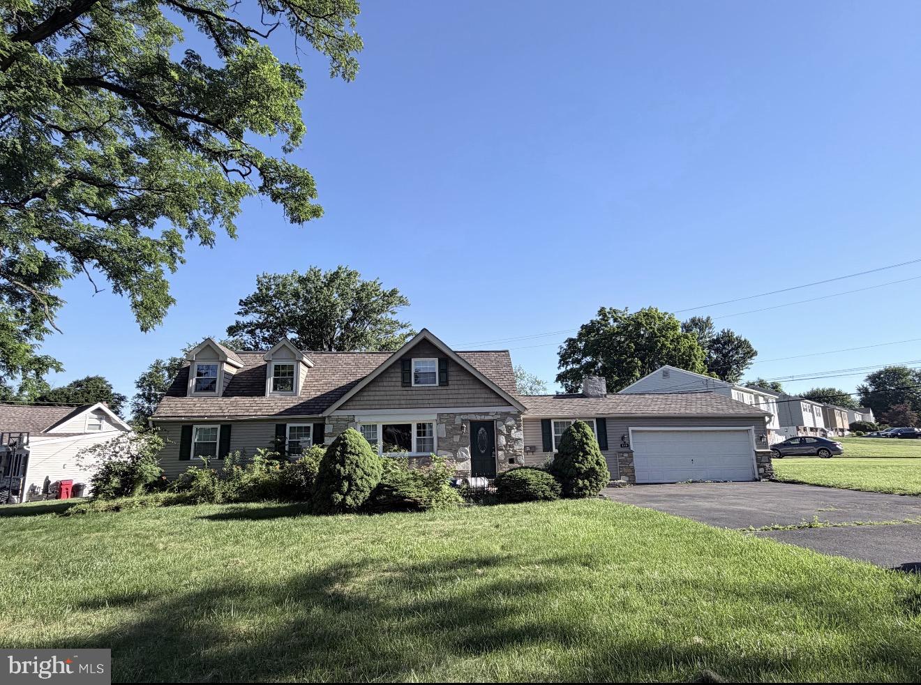 This charming Cape Cod home in Warminster Heights offers the perfect blend of comfort and functionality. With 1,937 sq. ft. of living space, this detached residence features 4 spacious bedrooms and a welcoming layout designed for everyday living. The inviting eat-in kitchen, complete with a dishwasher, is ideal for family meals and gatherings, while the cozy brick fireplace adds warmth and character to the living area. Enjoy outdoor living on the patio overlooking a generous 0.39-acre corner lot, providing plenty of space for relaxing, entertaining, gardening, or play. The convenience of main-floor laundry and an attached garage with additional storage makes daily living even easier. Located in a neighborhood with sidewalks and convenient access to shopping, dining, parks, and other local amenities, this well-maintained home combines classic charm with practical features. Don't miss the opportunity to make this inviting property your next home!