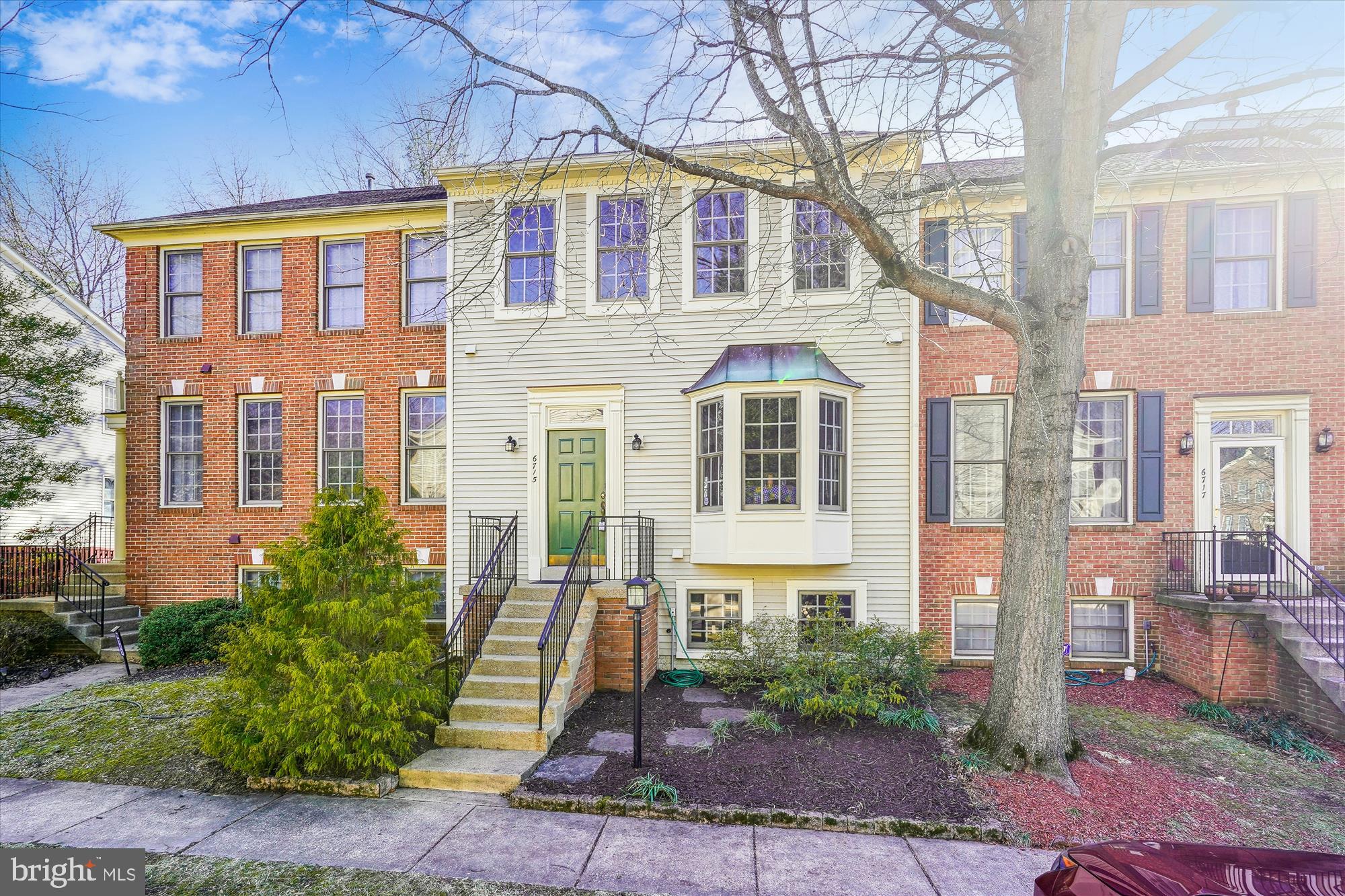 Stunning 3/4 Bedroom, 3.5 Bathroom, 3-Level Walkout Townhome in the Highly Sought-After Island Creek Neighborhood, Kingstowne, Alexandria

Don't miss the opportunity to own this beautifully refreshed townhome, featuring all-new paint, new carpet on both the upper and lower levels, and new luxury vinyl tile flooring on the main level. With updated light fixtures and newer kitchen appliances (2024), gas cooking, quartz countertops with ceramic backsplash, this home is move-in ready. The spacious kitchen boasts a bay window and an eat-in area, perfect for casual meals. The open concept living and dining areas offer a picturesque view of the treed forest conservation easement providing a peaceful and calming backdrop. With bump-outs on all three levels, this home offers expansive living space. A convenient half bath is located on the main level.

The primary bedroom is outfitted with new carpet and a modern ceiling fan. The en-suite primary bathroom features a luxurious frameless shower, jetted tub, double vanity, and a brand-new toilet. The upper level includes two secondary bedrooms, and the lower level offers an optional fourth bedroom, perfect for an office, along with a full bathroom that includes a bathtub/shower combo. The walkout basement leads to a private patio and a fenced-in backyard.

The utility room on the lower level includes a washer and dryer (as is), an oversized gas hot water heater replaced in June 2022, and newer furnace and AC system (2021).  Additional features include a refrigerator in the lower level ("as-is"). Two assigned parking directly in front of unit and ample visitor parking. Two assigned parking directly in front of unit and ample visitor parking.

Island Creek offers fantastic amenities, including a clubhouse, an outdoor pool, tot lots, walking trails, basketball and tennis courts, and much more. Conveniently located near major routes (495, 395, 95), Fort Belvoir, the Pentagon, Springfield Metro, and VRE, this home is ideally situated for both work and play.

You can't beat this unbeatable location and price. Don’t miss the Open House on 3/2 from 2-4 PM.