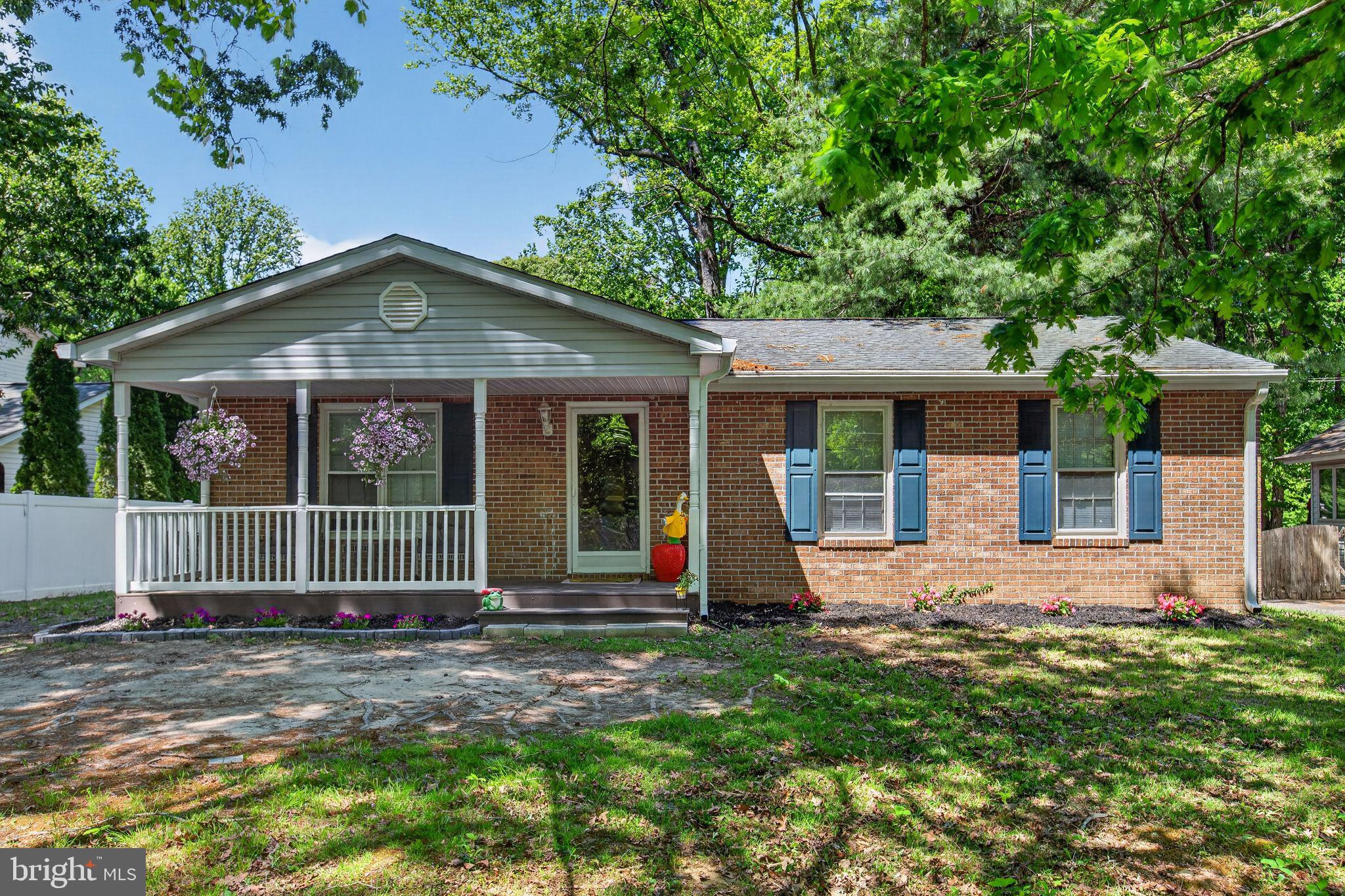 Welcome to this charming  one-level brick-front home in Chesapeake Ranch Estates. This homes front porch offers a warm and inviting entry perfect for relaxing mornings or evening unwinding. Inside, enjoy the convenience of single-level living with a functional layout designed for everyday comfort. 
Step outside on your back deck to enjoy a large backyard offering endless possibilities for outdoor entertaining, recreation, gardening, or pets. The detached shed with electricity provides excellent space for storage, hobbies, a workshop, or creative projects. Conveniently located near community amenities, parks, shopping, and dining, this property combines comfort, functionality, and outdoor space in a desirable setting.