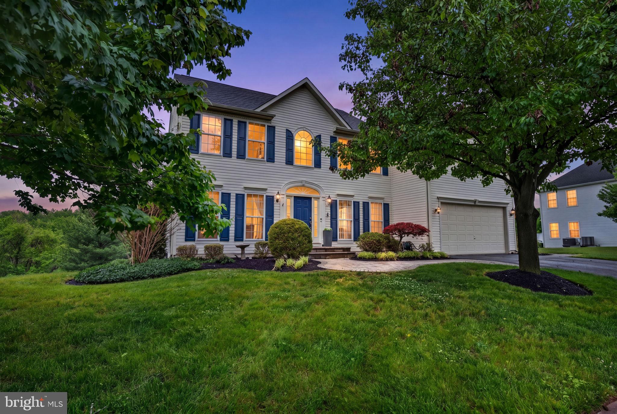 One of the largest and most sought-after models in the neighborhood, this beautifully updated home offers the perfect combination of space, style, and functionality, all set on a large lot backing to trees for added privacy and a more peaceful setting. From the moment you enter, the scale of the home stands out with hardwood flooring throughout the main level, a dramatic two-story family room filled with natural light and a gas fireplace, dual staircases, and spacious formal living and dining rooms that make the home feel both elegant and comfortable. A private main-level office, powder room, and laundry room add convenience and flexibility for today’s lifestyle needs. The fully renovated kitchen is truly the centerpiece of the home, designed with both everyday living and entertaining in mind. Features include granite countertops, updated cabinetry, stainless steel appliances, double wall ovens, and a cooktop built into the oversized island, along with a separate table space area overlooking the backyard. Upstairs, the oversized primary suite offers a true retreat with room for a sitting area, a huge walk-in closet, and a spacious bath featuring dual sinks, separate soaking tub and shower, and a private water closet. Three additional bedrooms offer generous room sizes and large closets, and the upper level also includes an additional full bath, providing a total of three full and one half baths throughout the home. The outdoor living spaces are just as impressive, with a screened porch and open deck overlooking the backyard and tree line, perfectly ideal for relaxing, entertaining, or enjoying the outdoors in every season.

The finished walkout lower level provides incredible additional living space with a large recreation room, media room, full bath, and an oversized storage room, offering endless possibilities for entertaining, hobbies, fitness, guests, or flexible living arrangements.

With its impressive size, updated finishes, versatile floorplan, and desirable Middletown location, this is the kind of home that rarely becomes available.