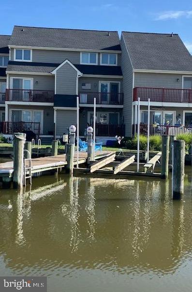 Waterfront living at it's best!  This home features 3 bedrooms and 3.5 bathrooms which includes 2 primary suites.  The property also has a 2 private decks overlooking the Warwick River and a pier with a  recently installed boat lift.  This unit was built in 2001 and has a sprinkler system, gas heat and gas fireplace, new roof and new boardwalk is being installed soon.  The home is in very good condition and ready to move into.  Enjoy beautiful sunsets and quick access to the Choptank River and Chesapeake Bay!!  Must see!!