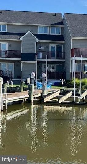 Waterfront living at its best!  This home features 3 bedrooms and 3.5 bathrooms which includes 2 primary suites allowing your guests to have an in-suite bathroom.  The property also has 2 private decks overlooking the Warwick River and a pier with a recently installed boat lift.  This unit was built in 2001 and has a sprinkler system, a large family room with a gas fireplace, new roof and a new boardwalk is being installed soon.  The home is in very good condition and ready to move into.  Enjoy beautiful sunsets and quick access to the Choptank River and Chesapeake Bay.  There are many nearby beaches, restaurants and shopping.  This is a must see!!