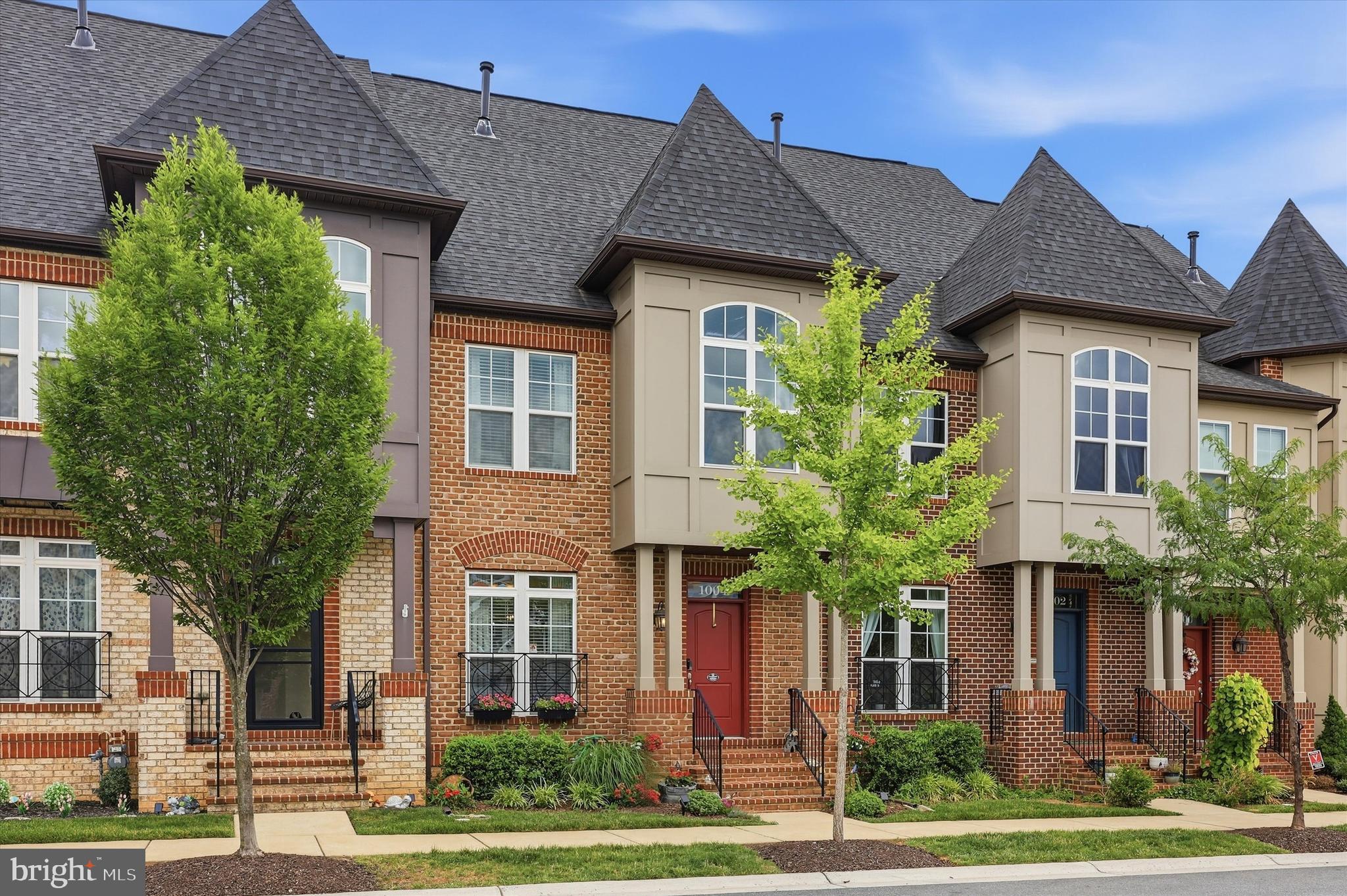 Beautifully updated interior townhome in the sought-after EastChurch community, just moments from downtown Frederick. This stunning 4 level, 4 bedroom, 3.5 bathroom home features modern finishes and stylish touches throughout, with abundant natural light, an open and inviting floor plan, hardwood flooring on the main level, and brand-new carpet throughout. The gourmet kitchen is designed for both everyday living and entertaining, offering generous counter space and high-end finishes, while the cozy living room fireplace creates the perfect space to unwind. Upstairs, you’ll find a beautiful primary suite with an ensuite bathroom, two additional bedrooms, and a full hallway bath. The spacious loft with its own private terrace offers incredible flexibility for a home office, lounge, or guest retreat. The finished basement expands the living space even further with a large recreation room, private fourth bedroom, and an additional full bathroom—ideal for guests or multi-generational living. Step outside to enjoy the private patio and easy access to the detached two-car garage. Located in a low-HOA community with fantastic amenities, this move-in-ready home offers the perfect blend of comfort, style, and convenience in one of Frederick’s most desirable neighborhoods. Schedule your showing today!