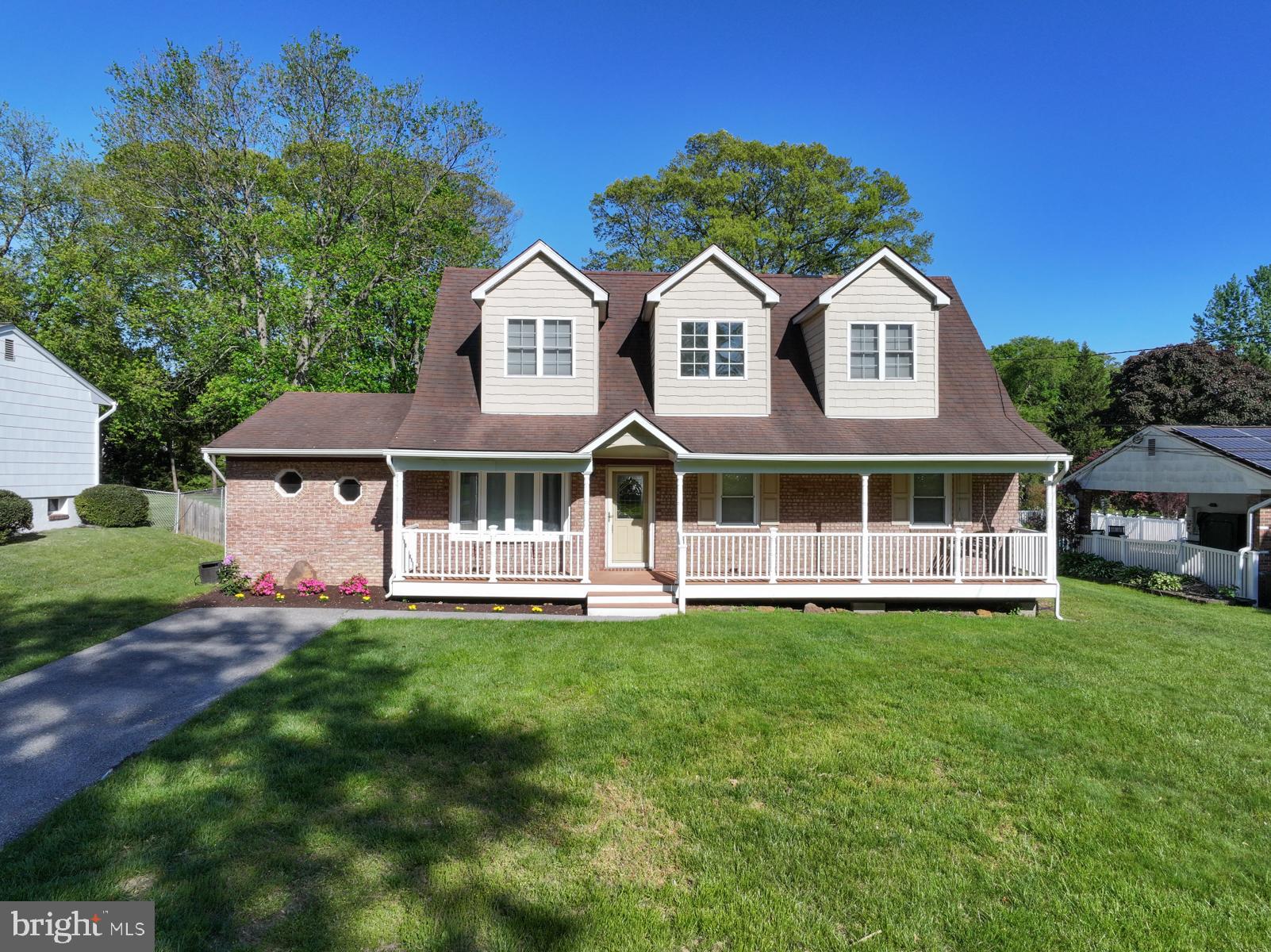 PRICE IMPROVEMENT - Welcome to 217 Oak Drive, well-maintained,  2-story Cape Cod Style Home in water-privileged Chelsea Beach is move-in ready.  Offering 4 Bedrooms (including 2 primary bedrooms) and 3 Full Baths.   The home's layout is designed for the entire family, offering ample space with a Living Room, Family Room and Recreation Room.  The kitchen is fully equipped with ample table space.  Cozy up in the Family Room with a brick wood-burning fireplace. 2 Bedrooms and a Full Bath are located on the Main Level.  Head upstairs to find 2 Spacious Primary Suites.    Step outside from the Recreation Room to the rear deck and large back yard.   Put your touches on the large unfinished basement, which offers possible office space and/or storage.   This home is situated on a generous flat lot 0.26-acre, to enjoy family fun.  The entire 2nd level and front porch were added to the home in 2010. Homeowners may join the voluntary association for a minimal fee to access the community boat ramp, swimming, canoeing/kayaking, and fishing. The Chelsea Beach neighborhood is near shopping, many local parks, golf course and easy access to Annapolis, Baltimore and DC.  Don't miss out, schedule your showing today!