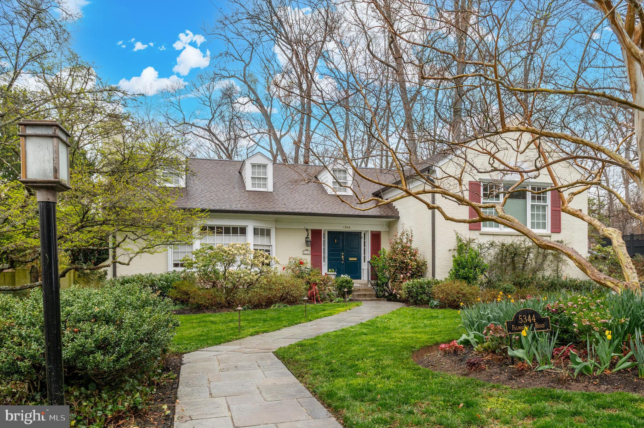 Available for the first time in a generation, this coveted Westmoreland Hills home sits on a prime 17,000 square foot lot backing to Little Falls Park — complete with a private path to the trails beyond. Professionally manicured landscaping frames the property front and back, while mature plantings provide exceptional privacy and a sense of seclusion that feels worlds away from the city. An in-ground pool completes the picture, delivering a resort-like retreat just steps from your door. Thoughtfully designed across multiple levels for both everyday living and effortless entertaining, this is a rare opportunity to own one of the neighborhood's most special settings.

The main floor welcomes with a gracious foyer that sets the tone for the interiors beyond. A generously scaled living room is anchored by a fireplace and framed by an oversized window that fills the space with natural light. Just beyond, a formal dining room connects seamlessly to both the kitchen and family room, creating an easy flow for gatherings. The updated gourmet kitchen is both stylish and functional, featuring an island, abundant storage, and stainless steel appliances. It opens to a sunny breakfast nook and an inviting family room with a decorative fireplace and direct access to the rear exterior—blurring the line between indoor and outdoor living.

Upstairs, the second level offers a flexible layout, including a spacious bedroom with its own en suite bath and walk-in closet—ideal as a secondary primary suite. Two additional bedrooms share a beautifully updated hall bath, with one distinguished by custom built-in shelving.

The top level is reserved for the primary suite, a serene escape with ample closet space and a large, spa-like bath designed for relaxation.

On the first lower level, an oversized den with a wall of built-in bookshelves and a striking stone fireplace opens directly to the patio, creating a warm and inviting gathering space. This level also includes a half bath and convenient access to the garage.

The second lower level expands the home’s versatility, offering a large recreation room with walk-out access, a fifth bedroom with its own exterior door, a full hall bath, and a dedicated storage/utility room. A screened-in porch extends the living space even further, perfect for enjoying the surrounding landscape. Known for its close proximity to Washington, D.C., Westmoreland Hills offers a rare blend of tranquility and convenience, with easy access to parks, trails, and top-tier amenities.
