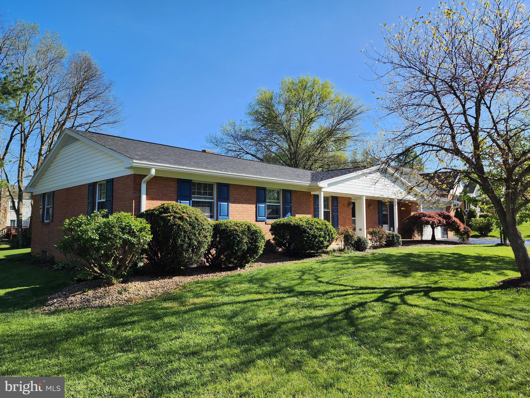 Very Well Built/Maintained Brick Ranch, Large Covered Front Porch, Entry Foyer, Formal Living Room That Could Easily Become a 4th Bedroom or Home Office, Formal DR, Updated Kitchen, Quartz Countertops, 1st Floor Family Room with a Fireplace, Family Room Exits To  Patio with Retractable Awning,  Hardwood & Laminate & Carpet ,Chair Rail, Crown Mold, Primary Bedroom Has Beautiful Enlarged  Bathroom, Super Laundry/Mud Rm Off the Kitchen Exits To Covered Rear Porch, Lower Level Partially Finished Rec Room & 2 Large Unfinished Areas with Workshop & Storage Space and/or Great Expansion Possibilities. Oversized 2 Car Gar, Beautiful Landscaped 4/10 Acre Lot with Mature Trees & Plantings. The Roof Was Just Replaced/April 2025 and Septic Pumped April 2025. Home Warranty For Your Peace of Mind.  Located Near I-70, For Shopping & Friendly Commuting, Meritus & Robinwood Medical Centers, Washington County Park & Black Rock Golf Course.