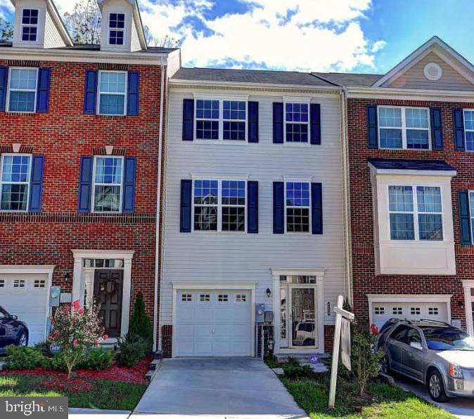 This 3-story garage townhouse with 3-story bump out is located in the area of Brandywine and is in close proximity to Kenwood Shopping Center, Walmart Supercenter and Rosedale Park. Home has flexible floor plan with spacious room sizes and hardwood floors, large family room that opens to lovely kitchen, master suite with sitting room , master bath with dual vanities and a large shower. The two additional bedroom in the upper level has good size with large closets.  The wide deck in rear is perfect for outdoor fun and entertainment.  The front attached garage makes this home complete.