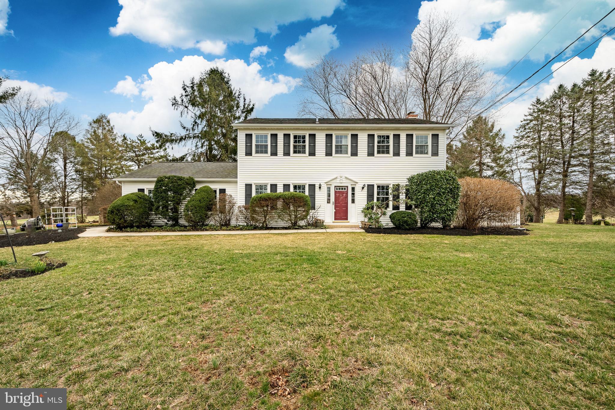 Tucked away on a private cul-de-sac, this stately 4-bedroom, 2.5-bath Colonial offers the perfect balance of peaceful countryside living and modern convenience. With golf course views from the front door and expansive open field views in the back, this home is ideally positioned near Coatesville Country Club and the reservoir, while still providing easy access to major routes.  Thoughtfully renovated and modernized, this home features newly updated bathrooms and powder rooms, fresh finishes, and beautiful hardwood floors throughout. The eat-in kitchen includes abundant dual toned cabinetry,  ample countertop space for all your small appliances, and stainless steel appliances - creating a stylish and functional cooking space. The family room is a cozy retreat with a grand stone fireplace with wood accent wall and a sliding glass door leading to the brick patio, where lush, park-like landscaping makes the private backyard feel like your own personal oasis with the perfect ambiance from the koi pond.  Upstairs you will find the large primary bedroom with a walk in closet & completely renovated bathroom filled with modern finishes, tile shower & tile flooring.  Three additional bedrooms can be found down the hall with a completely renovated hall bathroom centrally located for every day convenience. Meticulously maintained and move-in ready! Enjoy all that the home & the Coatesville Country Club have to offer! Schedule your showing today!